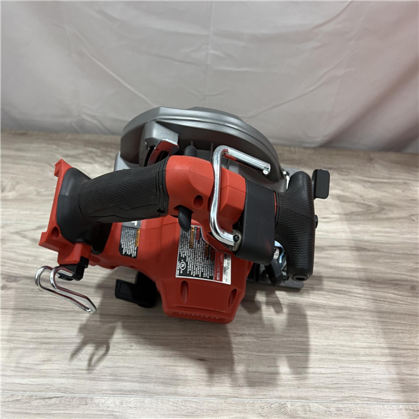 AS-IS Milwaukee FUEL 18V Lithium-Ion Brushless Cordless 6-1/2 in. Circular Saw (Tool-Only)