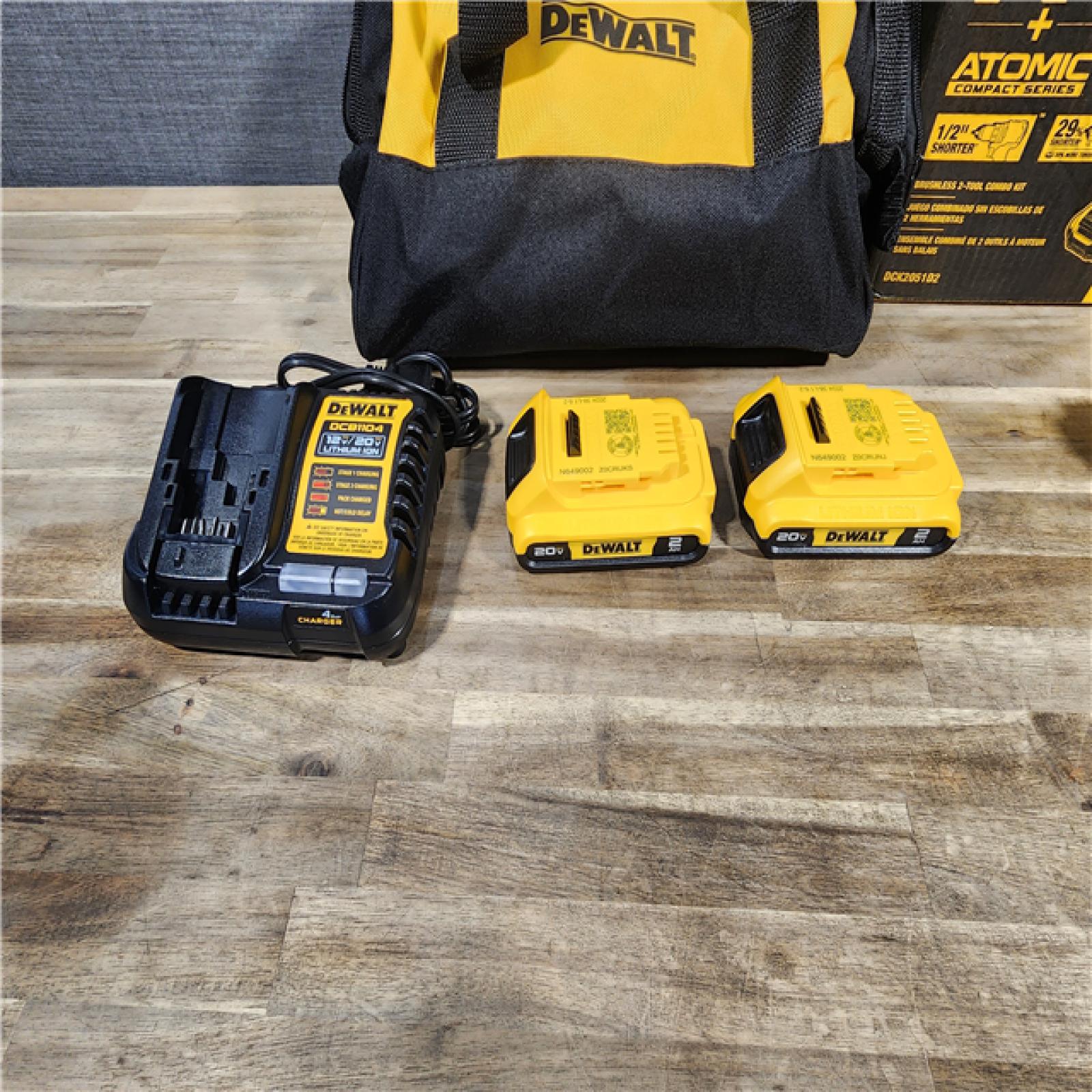 HOUSTON LOCATION - AS-IS DEWALT 20V MAX XR Cordless Drill/Driver, ATOMIC Impact Driver 2 Tool Combo Kit, (2) 2.0Ah Batteries, Charger, and Bag