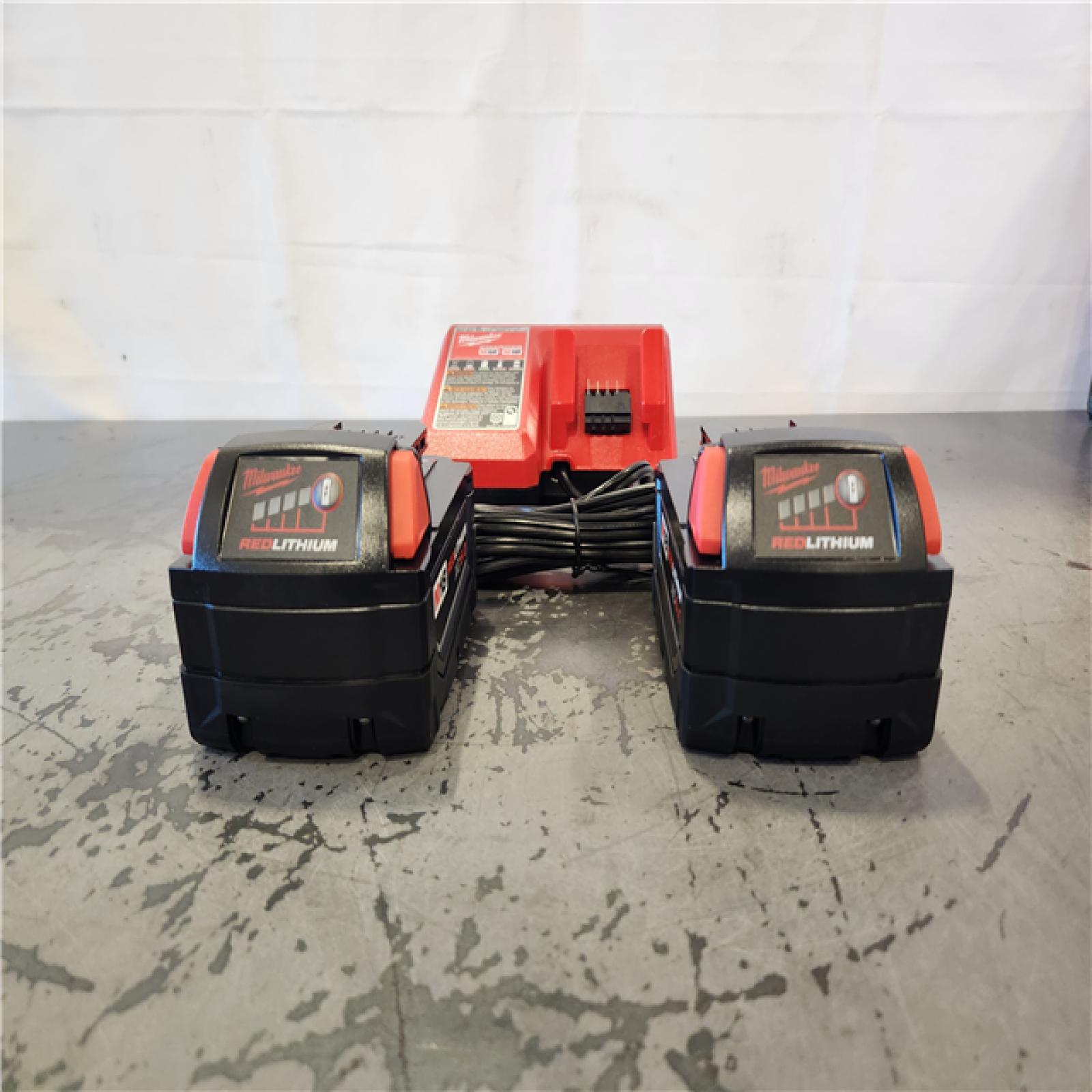 AS-IS- Milwaukee 18-Volt Lithium-Ion XC Starter Kit with Two 5.0Ah Batteries and Charger