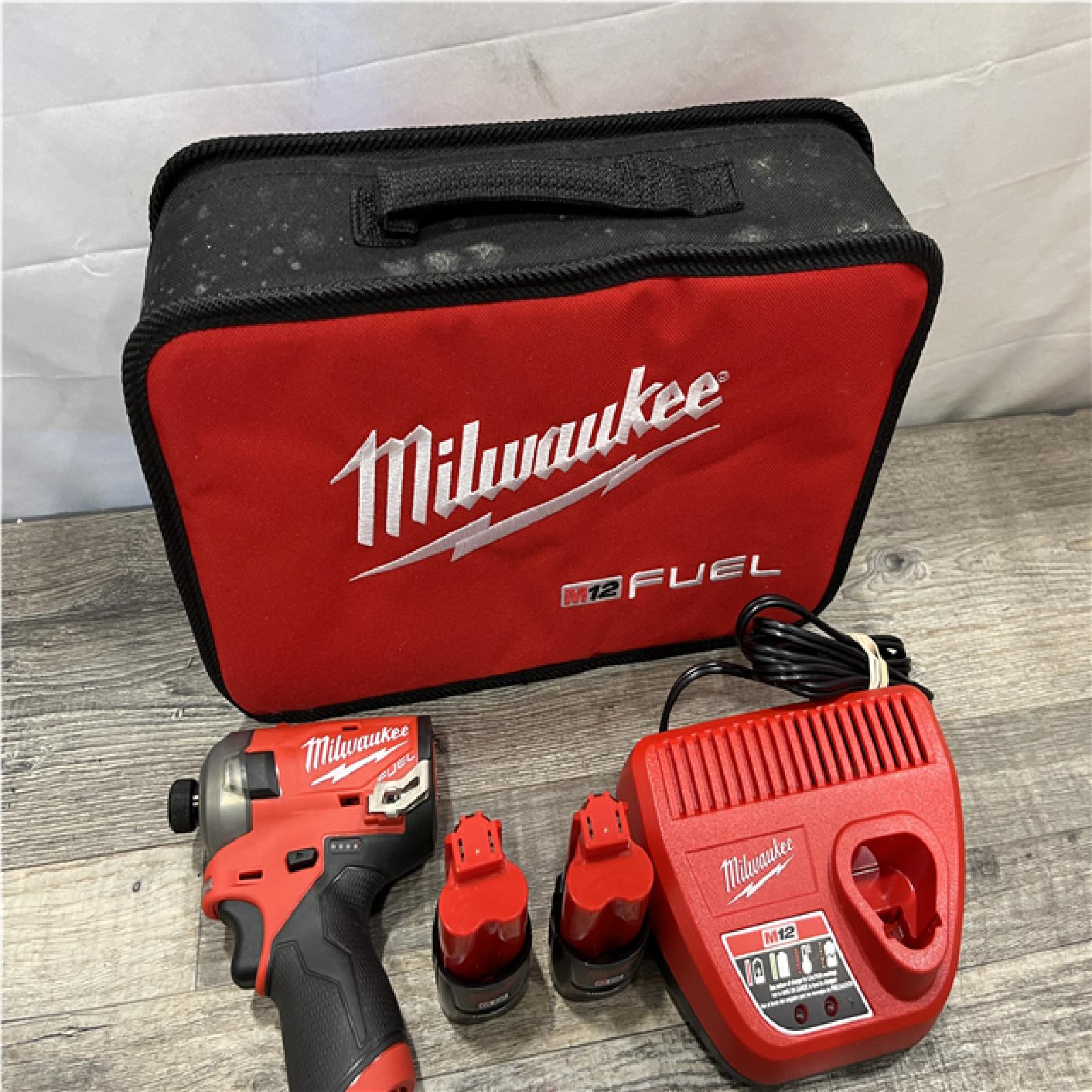 AS-IS Milwaukee FUEL SURGE 12V Lithium-Ion Brushless Cordless 1/4 in. Hex Impact Driver Compact Kit
