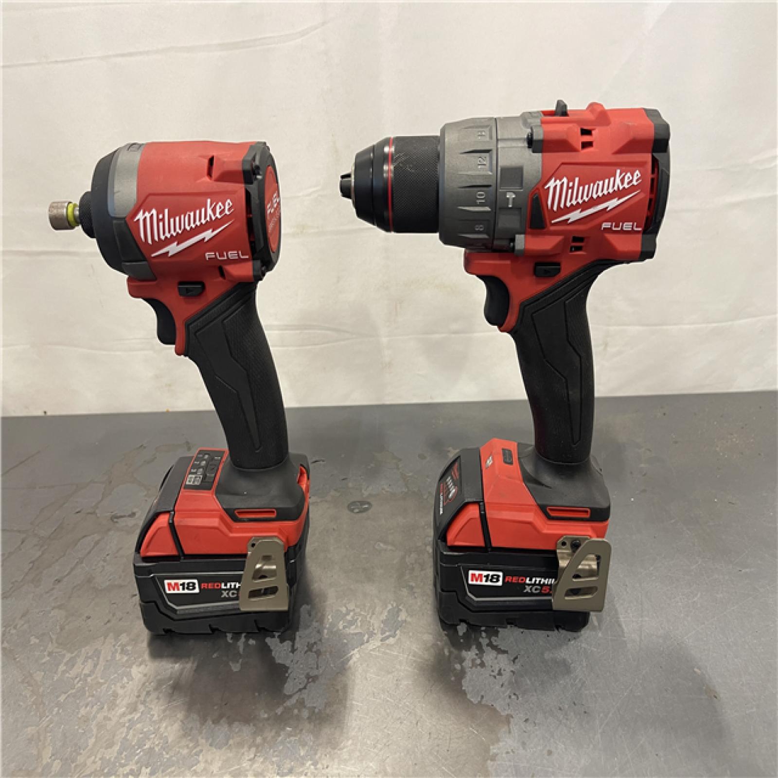 AS-IS- MILWAUKEE FUEL 18V Lithium-Ion Brushless Cordless Hammer Drill and Impact Driver Combo Kit