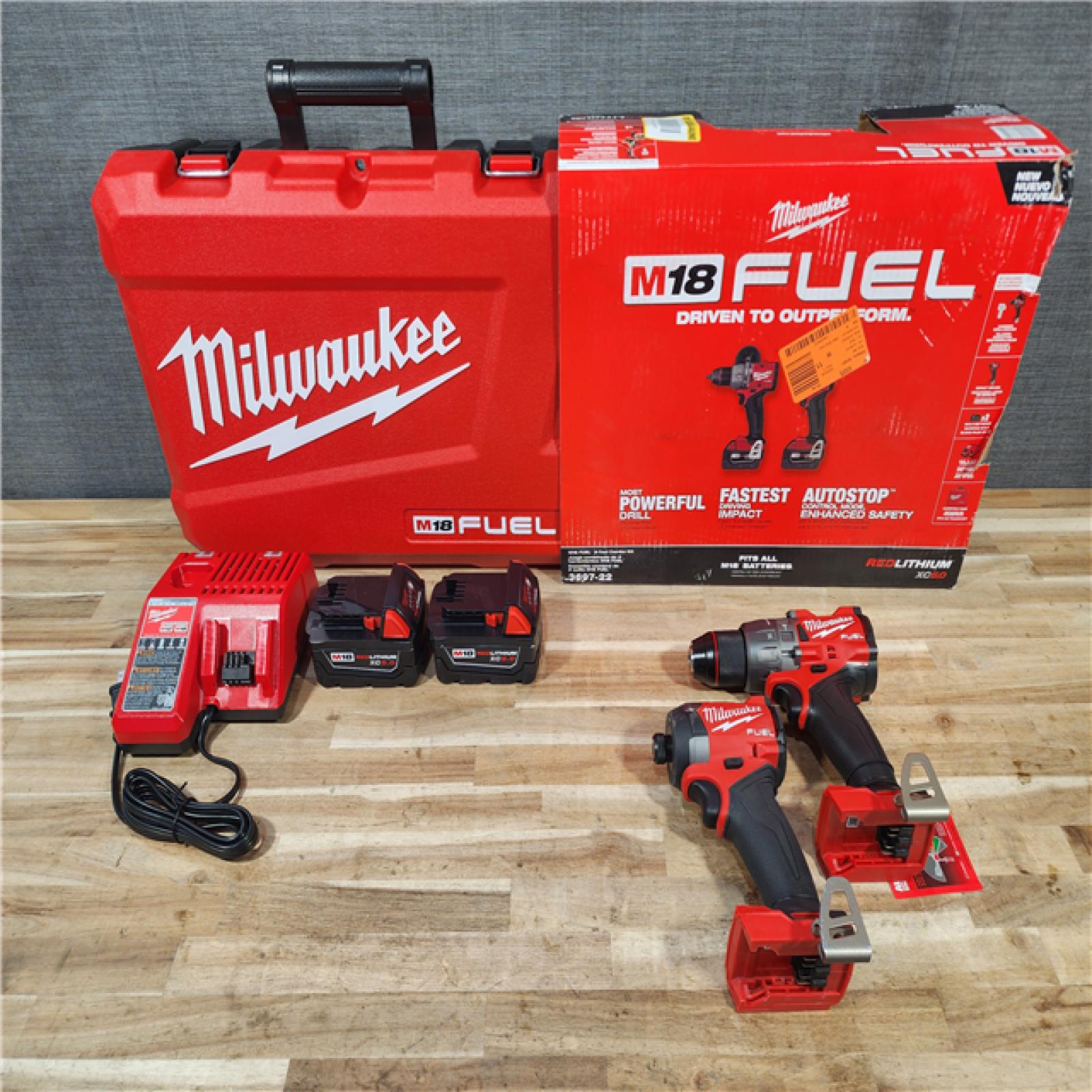 HOUSTON LOCATION - AS-IS Milwaukee FUEL 18V Lithium-Ion Brushless Cordless Hammer Drill and Impact Driver Combo Kit
