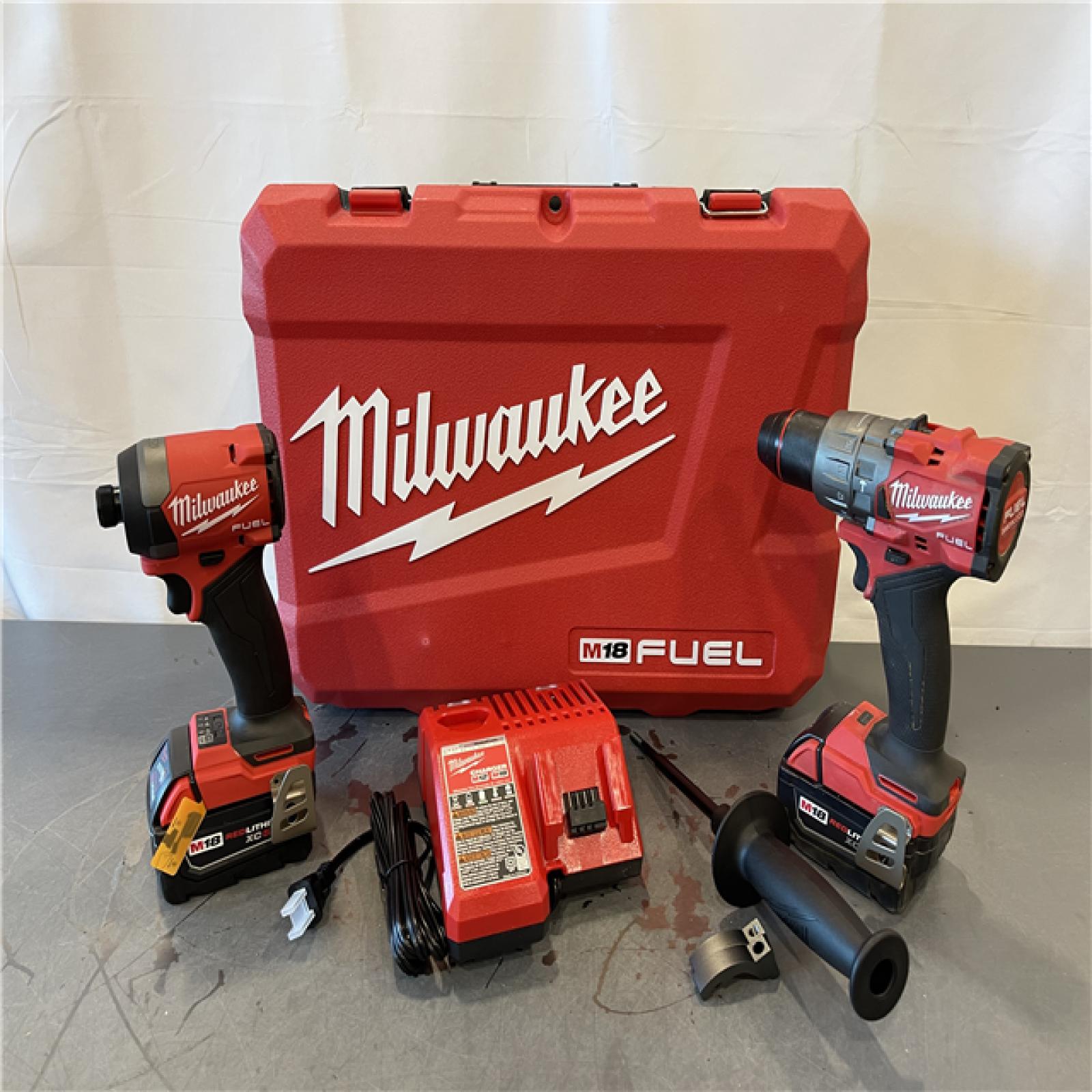 AS-IS - MILWAUKEE FUEL 18V Lithium-Ion Brushless Cordless Hammer Drill and Impact Driver Combo Kit