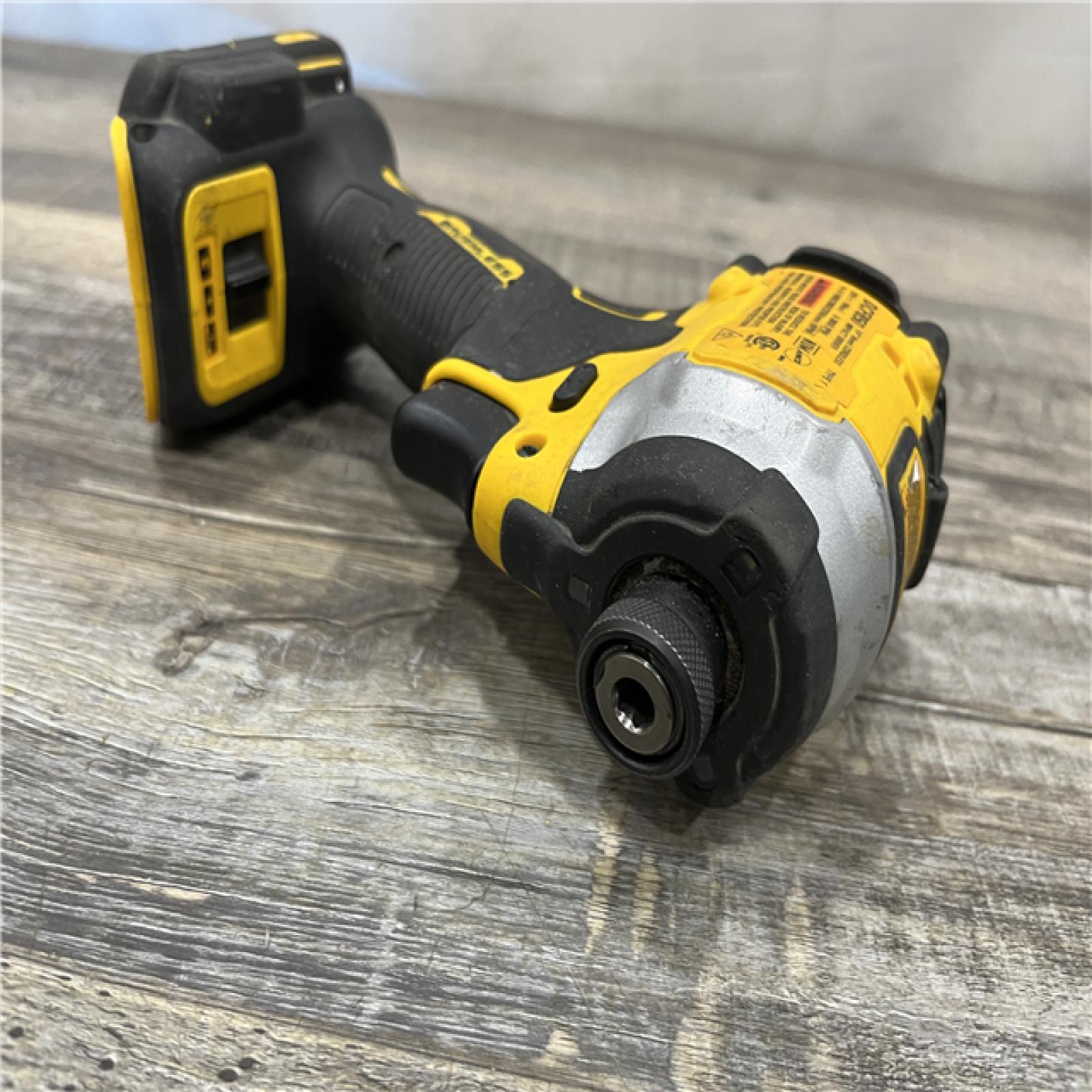 AS-IS DEWALT ATOMIC 20V MAX Cordless Brushless Compact 1/4 in. Impact Driver (Tool Only)
