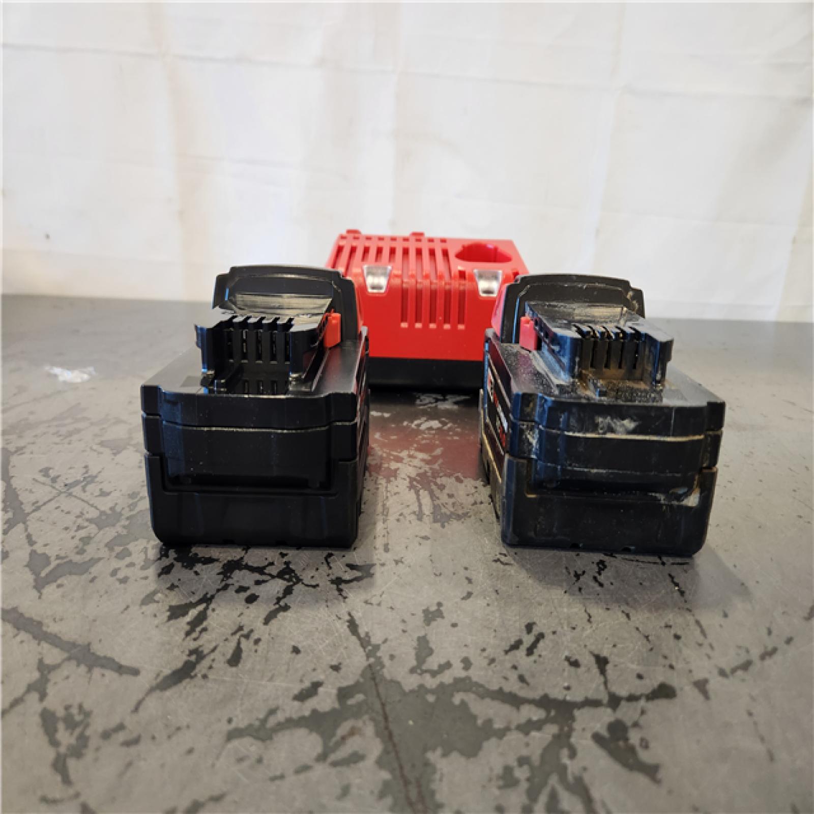 AS-IS- Milwaukee 18-Volt Lithium-Ion XC Starter Kit with Two 5.0Ah Batteries and Charger