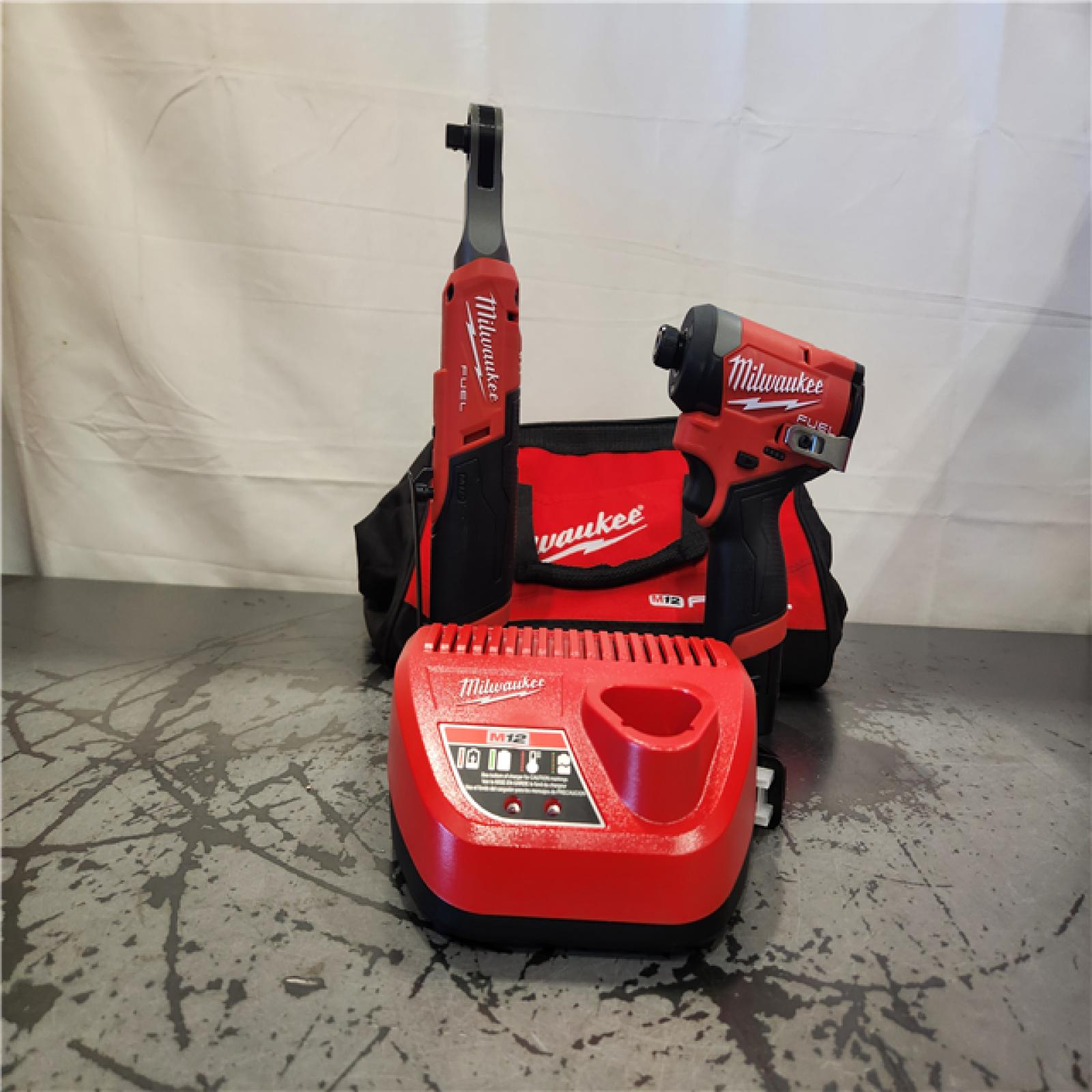 AS-IS- Milwaukee M12 FUEL 12V Lithium-Ion Cordless 3/8 in. Ratchet and 1/4 in. Impact Driver Kit