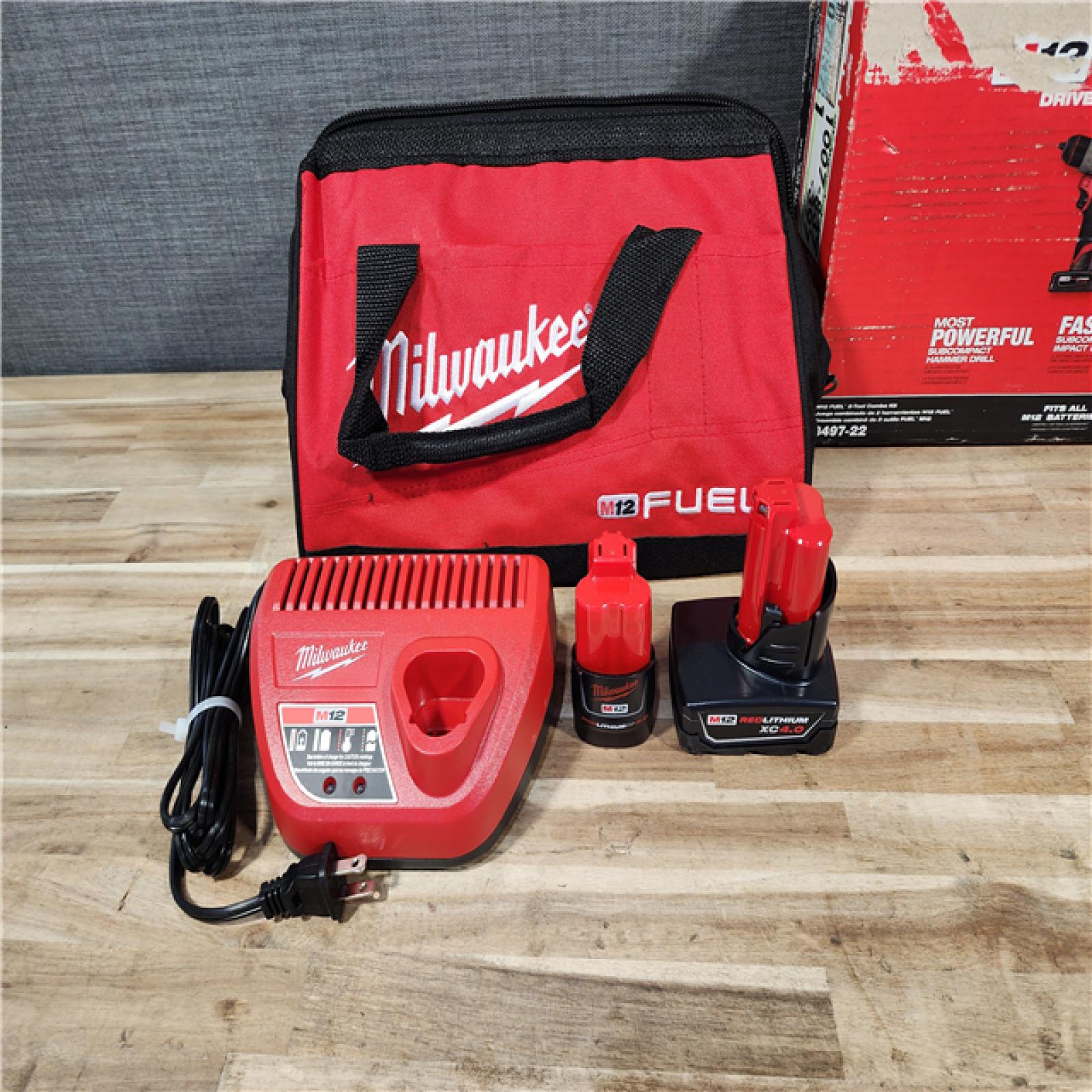 HOUSTON LOCATION - AS-IS Milwaukee  FUEL 12-Volt Lithium-Ion Brushless Cordless Hammer Drill and Impact Driver Combo Kit