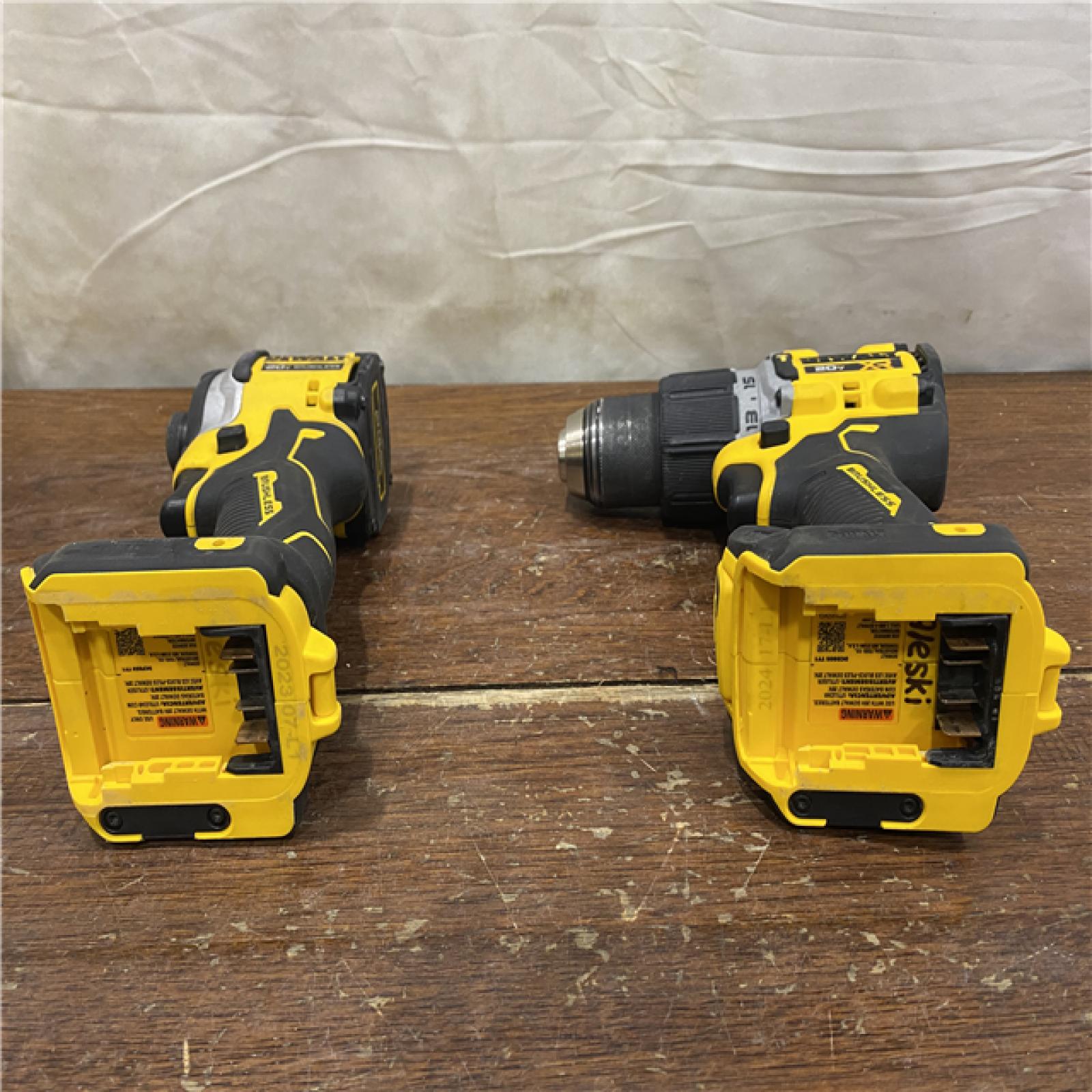 AS-IS DEWALT 20V MAX XR Hammer Drill and ATOMIC Impact Driver 2 Tool Cordless Combo Kit with (2) 4.0Ah Batteries, Charger, and Bag