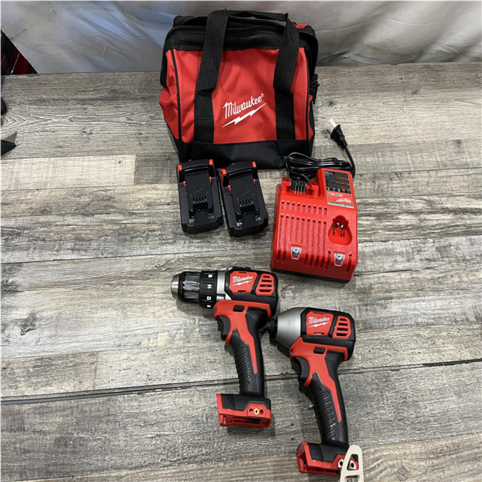 AS-IS Milwaukee 18V Lithium-Ion Cordless Drill Driver/Impact Driver Combo Kit