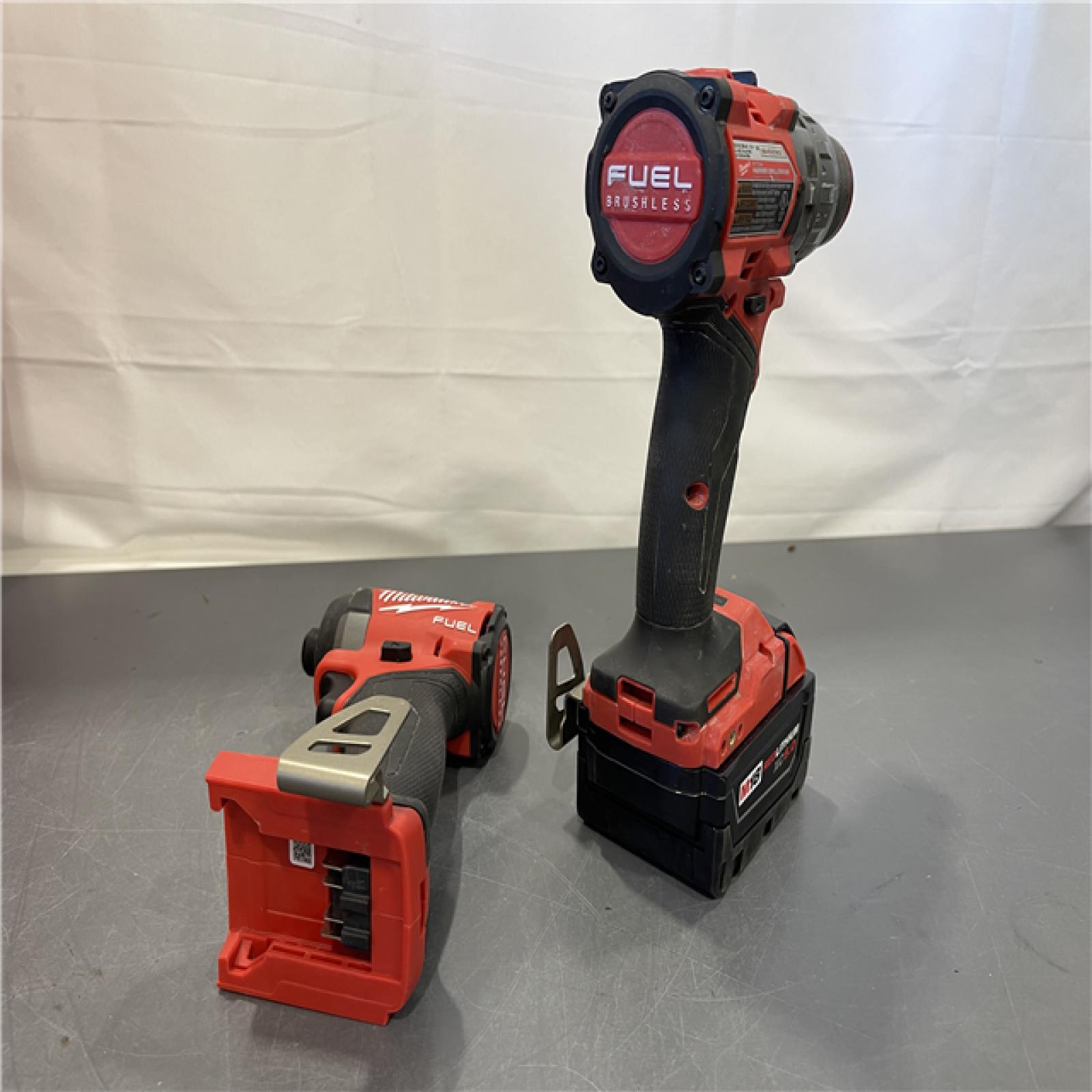 AS-IS - MILWAUKEE FUEL 18V Lithium-Ion Brushless Cordless Hammer Drill and Impact Driver Combo Kit