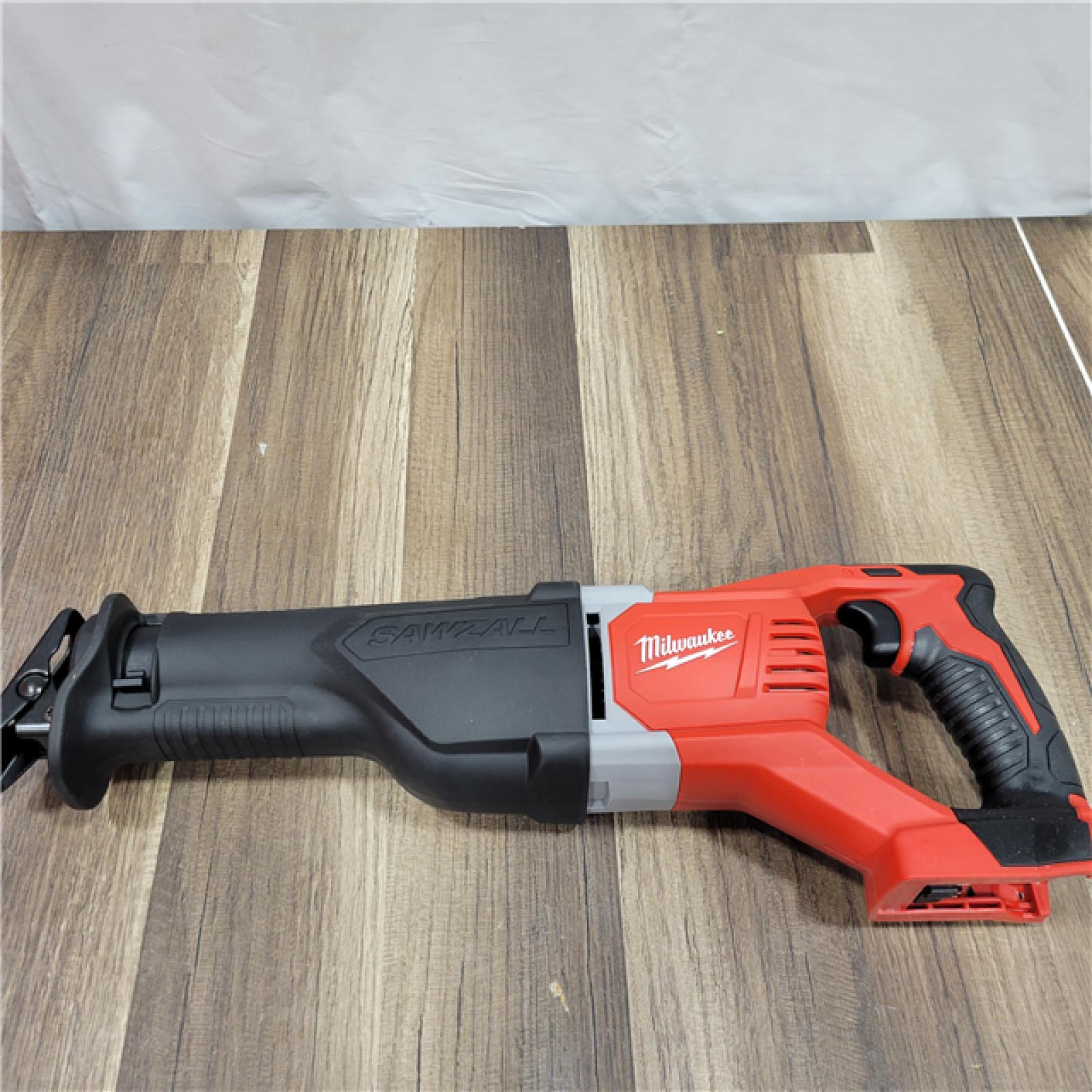 AS-IS MILWAUKEE M18 18V Lithium-Ion Cordless Combo Tool Kit with Two 3.0Ah Batteries, 1-Charger, 1-Tool Bag (4-Tool)