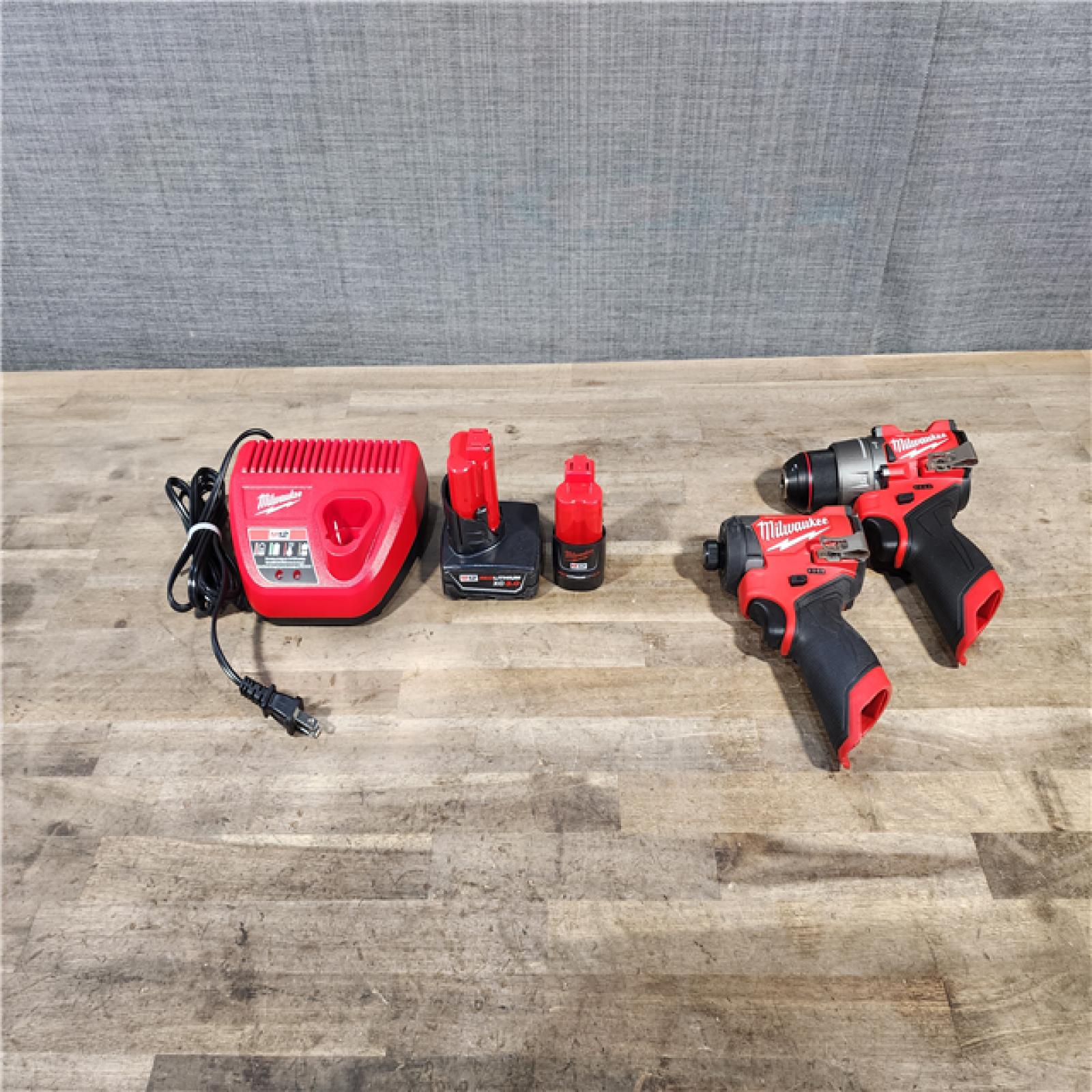 HOUSTON LOCATION - AS-IS Milwaukee 3497-22 12V Brushless Hammer Drill and Impact Driver Combo Kit