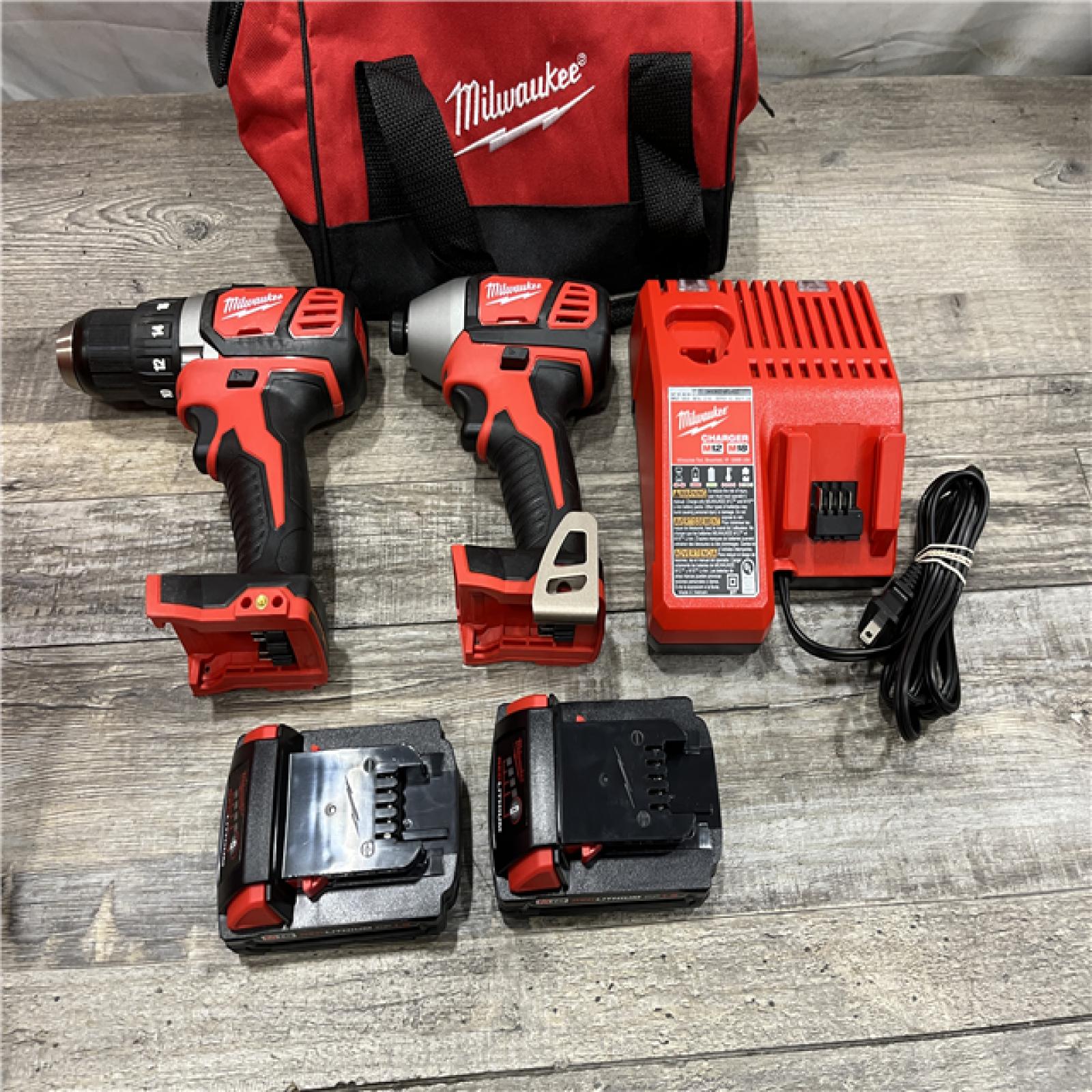 AS-IS Milwaukee 18V Lithium-Ion Cordless Drill Driver/Impact Driver Combo Kit