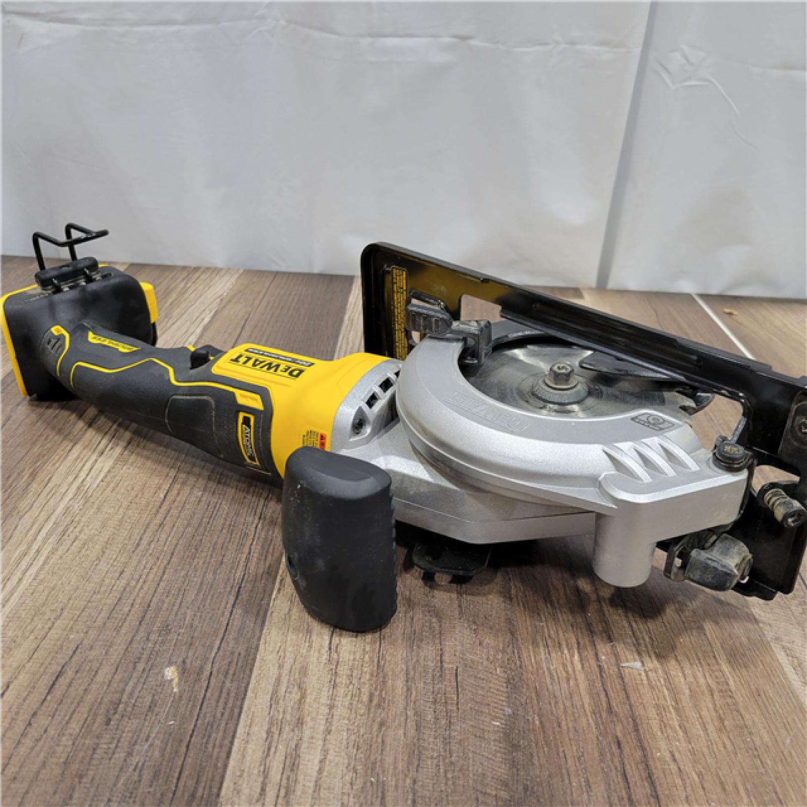 AS-IS DEWALT ATOMIC 20V MAX Cordless Brushless 4-1/2 in. Circular Saw (Tool Only)