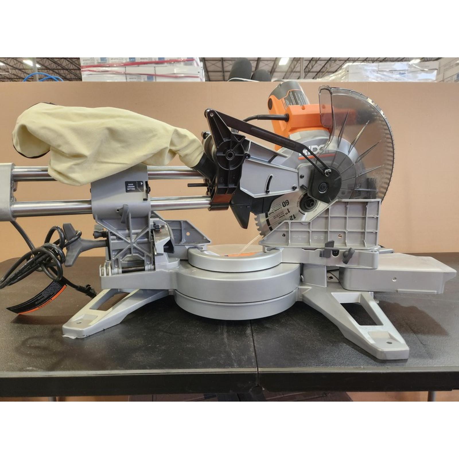 Phoenix NEW RIDGID 15 Amp Corded 12 in. Dual Bevel Sliding Miter Saw with 70 Deg. Miter Capacity and LED Cut Line Indicator