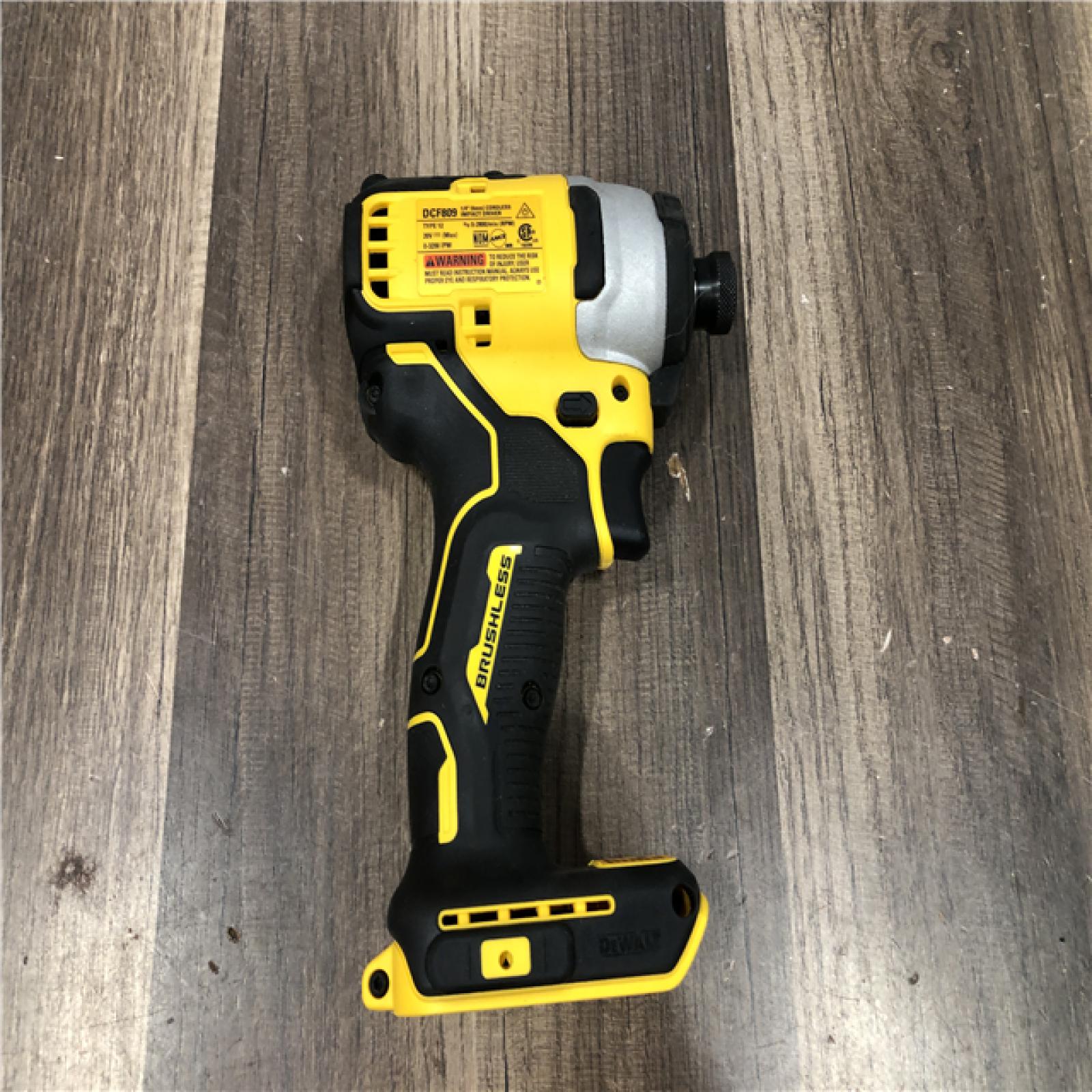 AS-IS DEWALT ATOMIC 20V MAX Cordless Brushless Compact 1/4 in. Impact Driver (Tool Only)