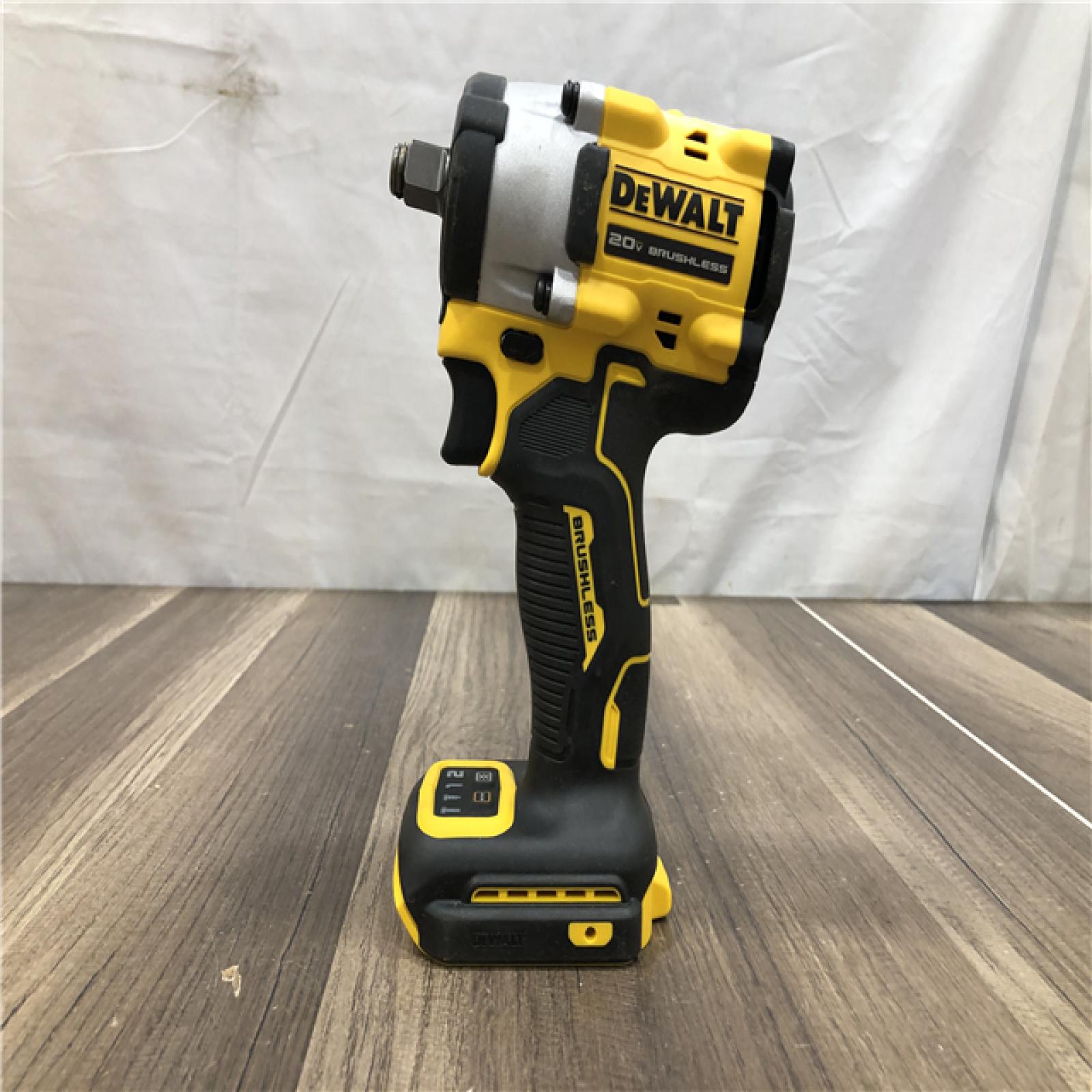 AS-IS DEWALT ATOMIC 20V MAX Cordless Brushless 1/2 in. Variable Speed Impact Wrench (Tool Only)