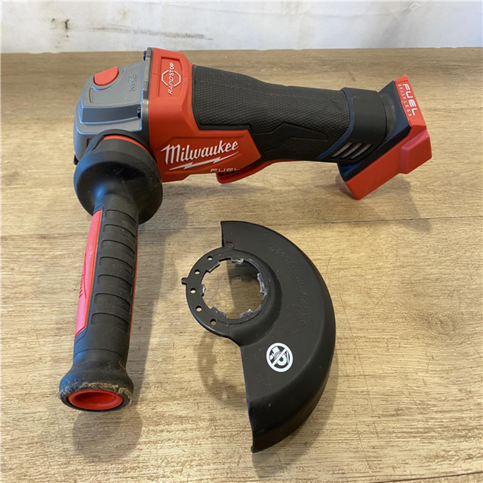 AS-IS Milwaukee FUEL 18V Lithium-Ion Brushless Cordless 4-1/2 in./5 in. Grinder w/Paddle Switch (Tool-Only)