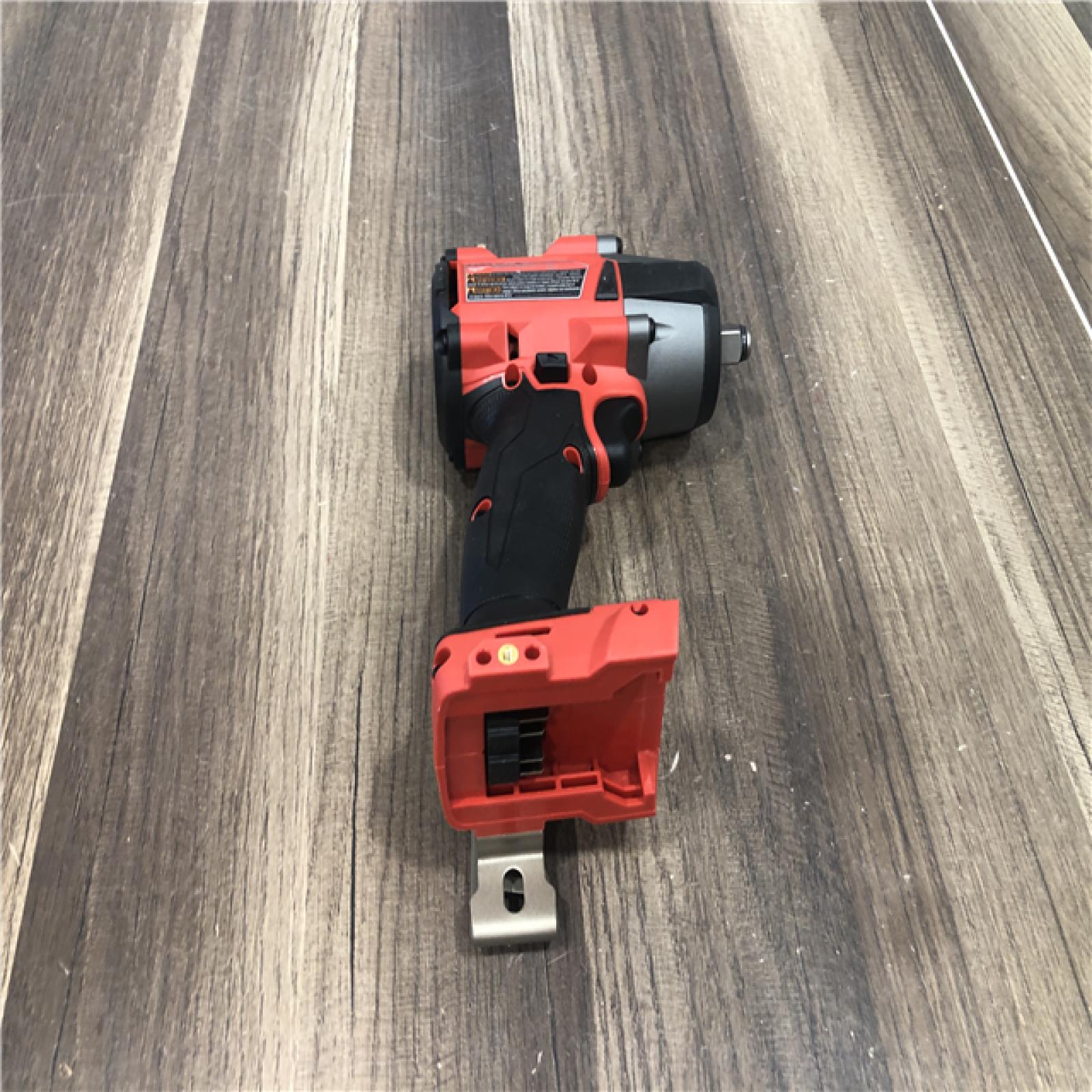 AS-IS Milwaukee FUEL Gen-2 18V Lithium-Ion Brushless Cordless Mid Torque 1/2 in. Impact Wrench w/Friction Ring (Tool-Only)