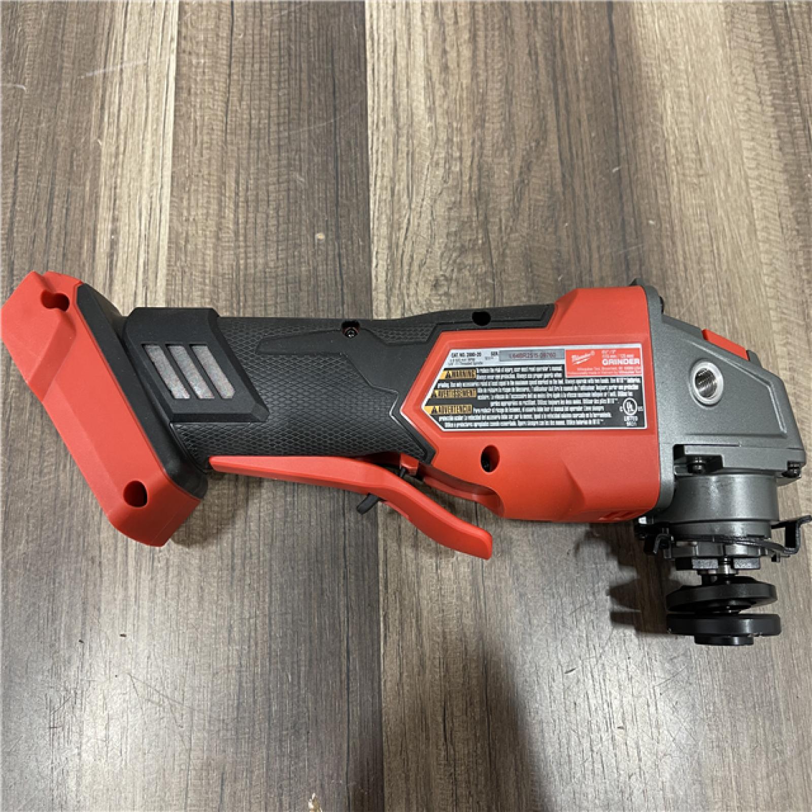 AS-IS Milwaukee FUEL 18V Lithium-Ion Brushless Cordless 4-1/2 in./5 in. Grinder w/Paddle Switch (Tool-Only)