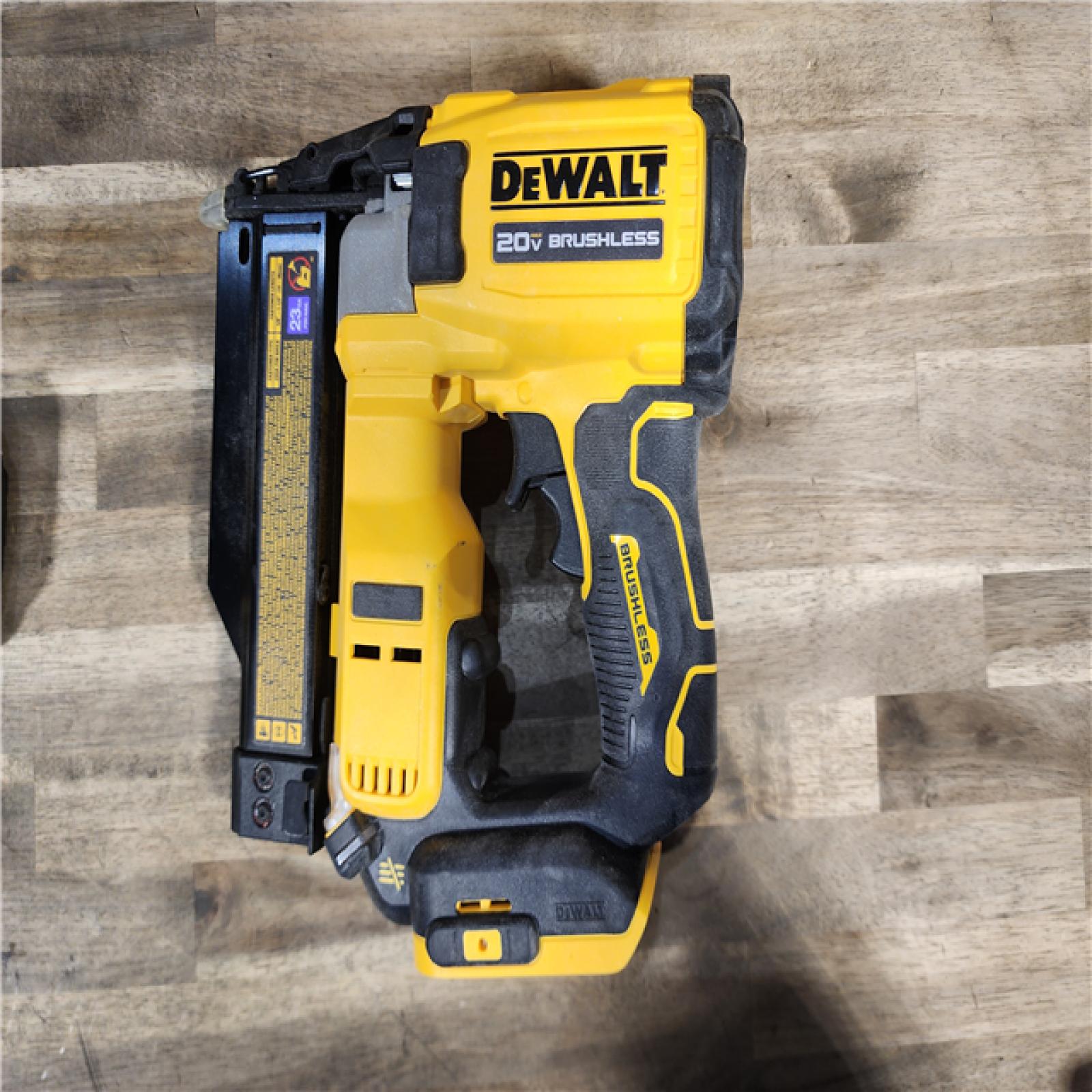HOUSTON LOCATION - AS-IS DEWALT ATOMIC 20V MAX Lithium Ion Cordless 23 Gauge Pin Nailer Kit with 2.0Ah Battery and Charger
