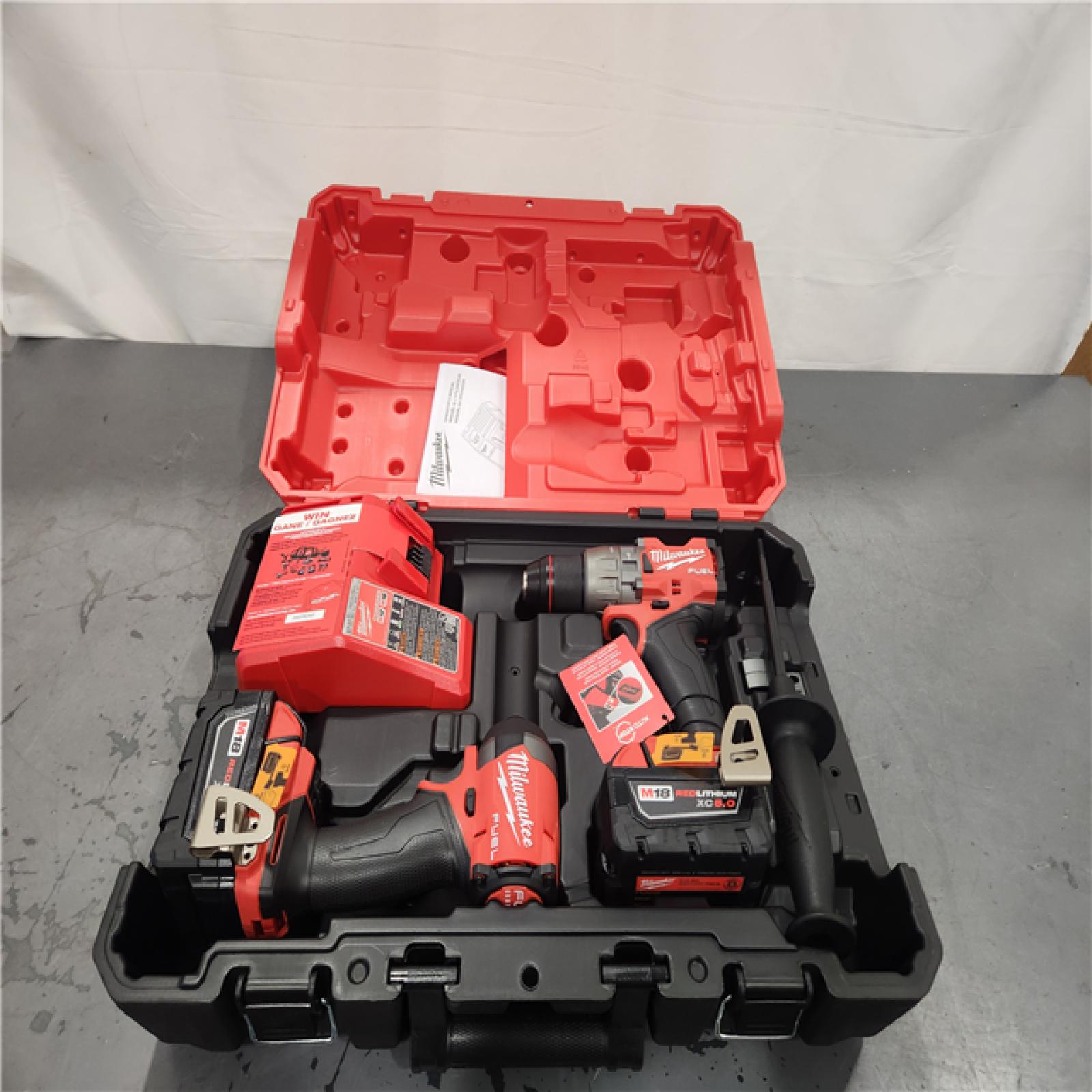 AS-IS- Milwaukee  FUEL 18V Lithium-Ion Brushless Cordless Hammer Drill and Impact Driver Combo Kit