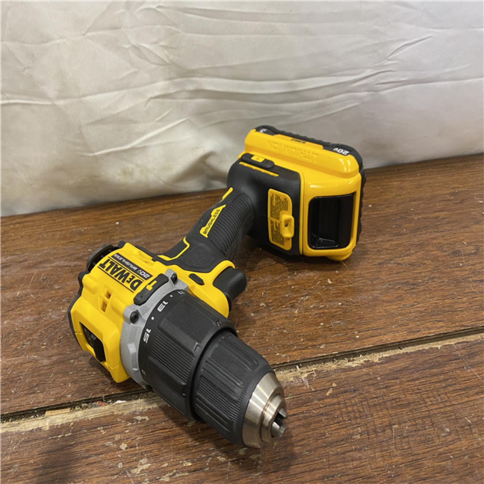 AS-IS DEWALT ATOMIC 20-Volt Lithium-Ion Cordless 1/2 in. Compact Hammer Drill with 3.0Ah Battery, Charger and Bag