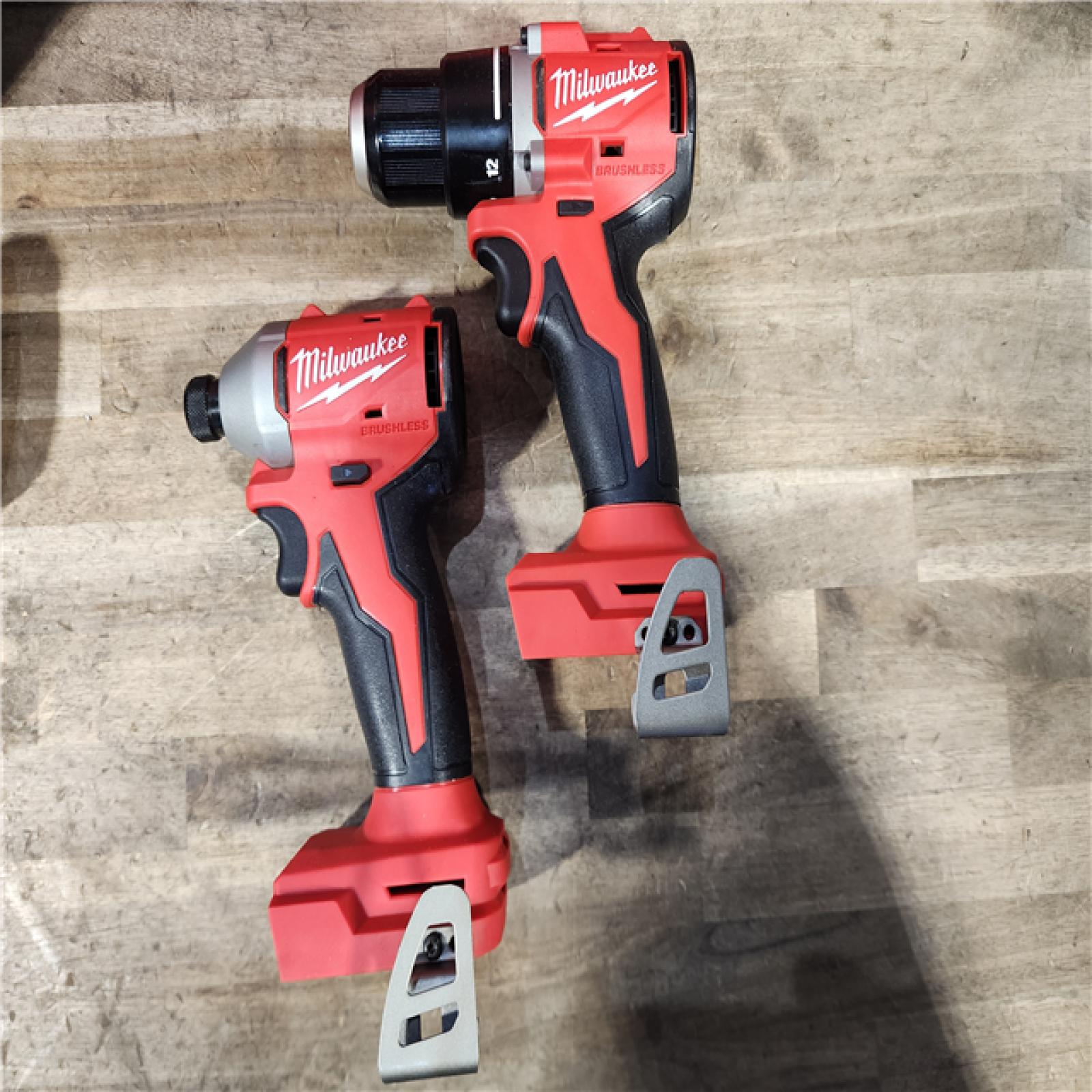 HOUSTON LOCATION - AS-IS Milwaukee M18 18V Lithium-Ion Brushless Cordless Compact Drill/Impact Combo Kit (2-Tool) W/(2) 2.0 Ah Batteries  Charger & Bag
