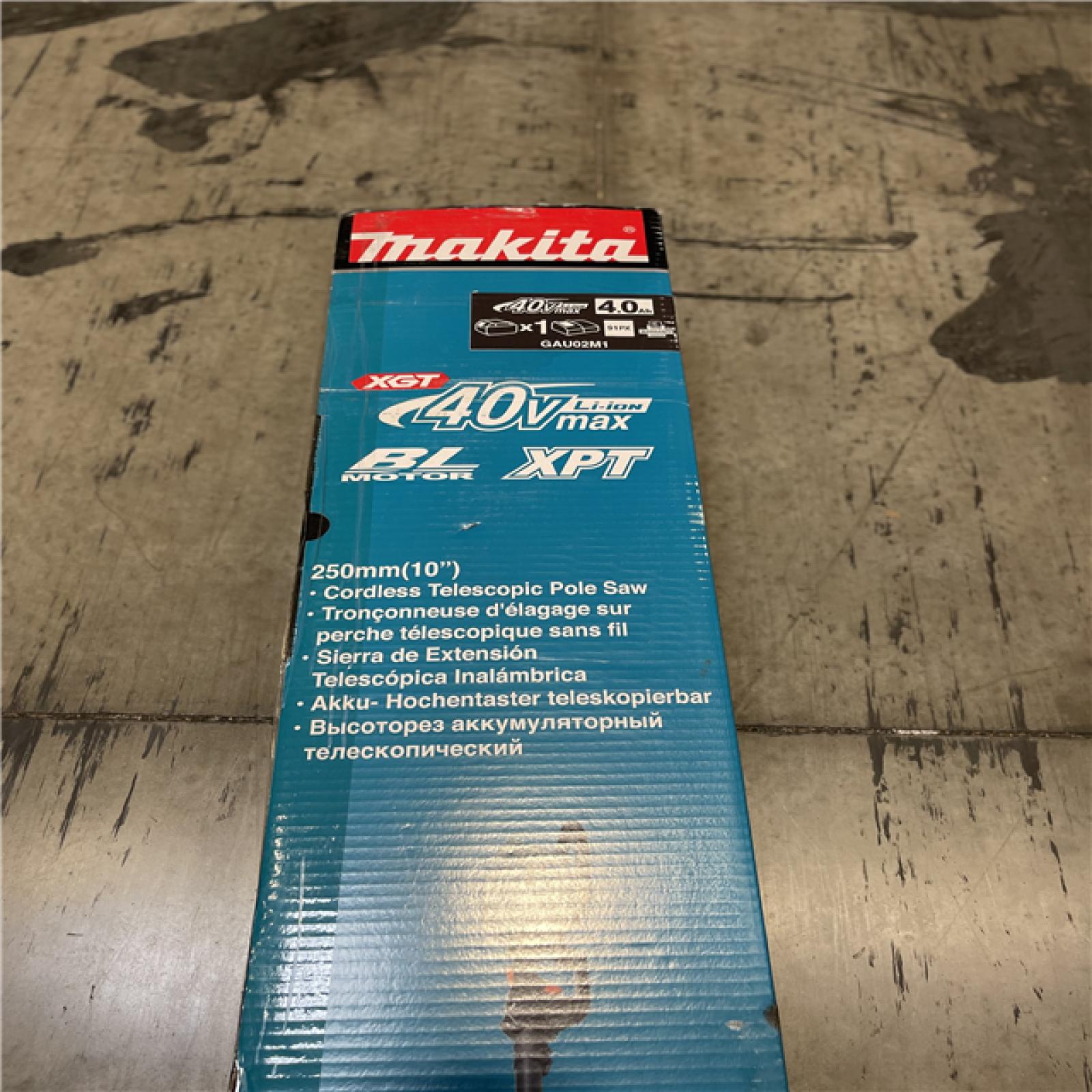 NEW!- Makita XGT 40V max Brushless Cordless 10 in. Telescoping Pole Saw Kit  13 ft. Length (4.0Ah)
