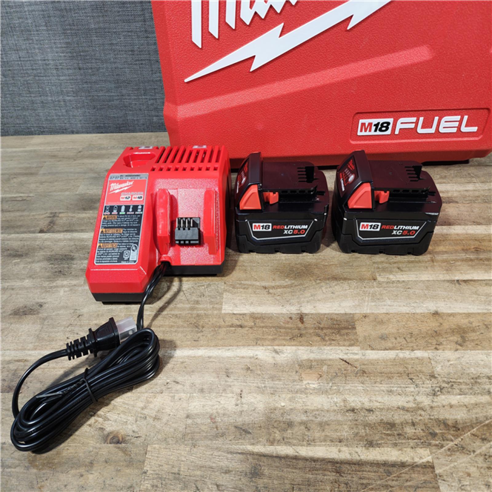 HOUSTON LOCATION - AS-IS Milwaukee FUEL 18V Lithium-Ion Brushless Cordless Hammer Drill and Impact Driver Combo Kit