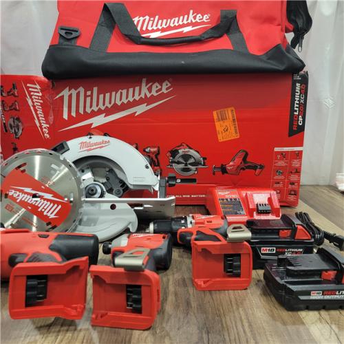 AS-IS Milwaukee M18 18-Volt Lithium-Ion Brushless Cordless Combo Kit (4-Tool) with 2-Batteries, 1-Charger and Tool Bag