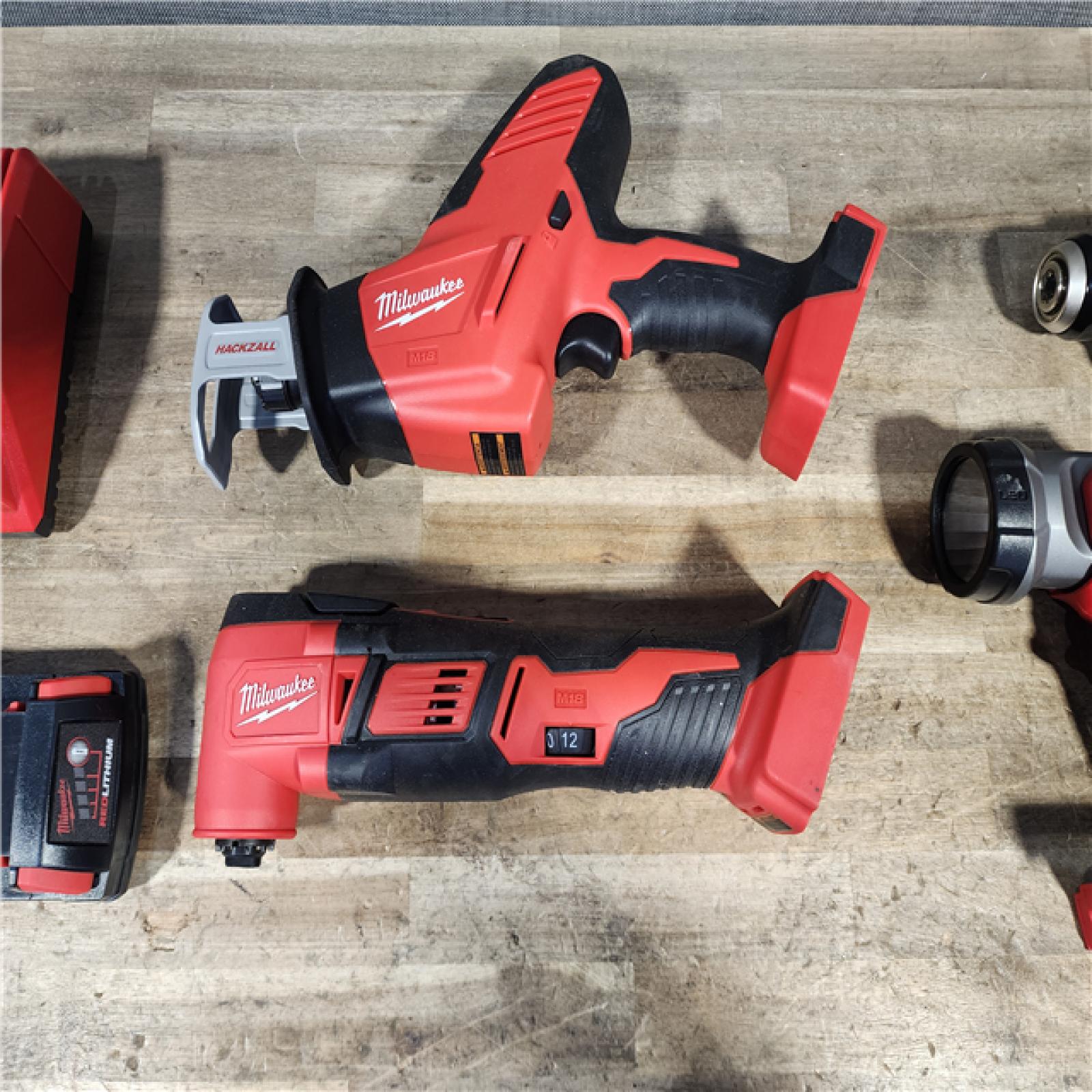 HOUSTON LOCATION - AS-IS MILWAUKEE 4 TOOL COMBO KIT W/ (2) BATTERY & CHARGER