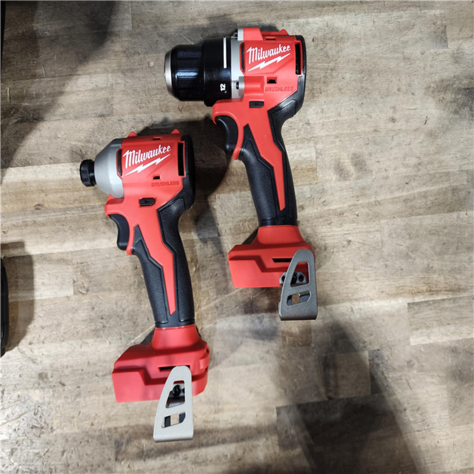 HOUSTON LOCATION - AS-IS Milwaukee M18 18V Lithium-Ion Brushless Cordless Compact Drill/Impact Combo Kit (2-Tool) W/(2) 2.0 Ah Batteries  Charger & Bag