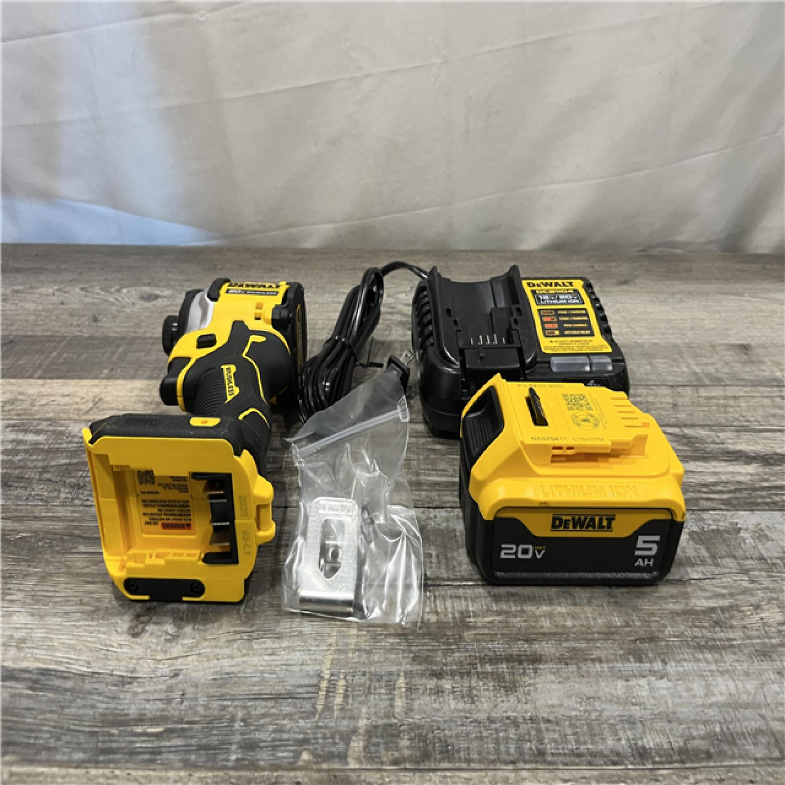 AS-IS DEWALT ATOMIC 20V MAX Lithium-Ion Cordless 1/4 in. Brushless Impact Driver Kit