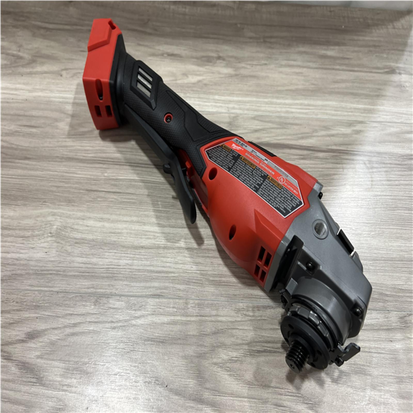 AS-IS Milwaukee FUEL 18-Volt Lithium-Ion Brushless Cordless 4-1/2 in./6 in. Braking Grinder with Paddle Switch (Tool-Only)