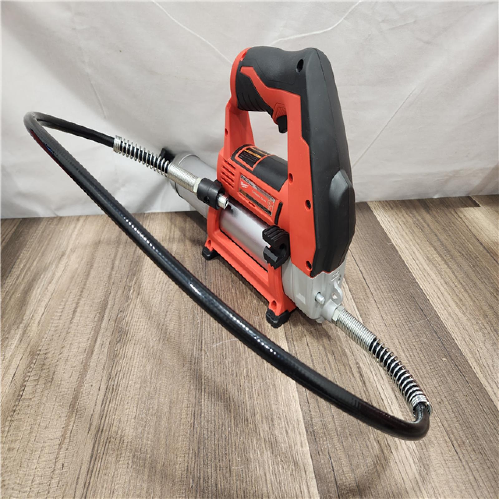 AS-IS- Milwaukee M12 Cordless LITHIUM-ION Grease Gun (Tool-Only)