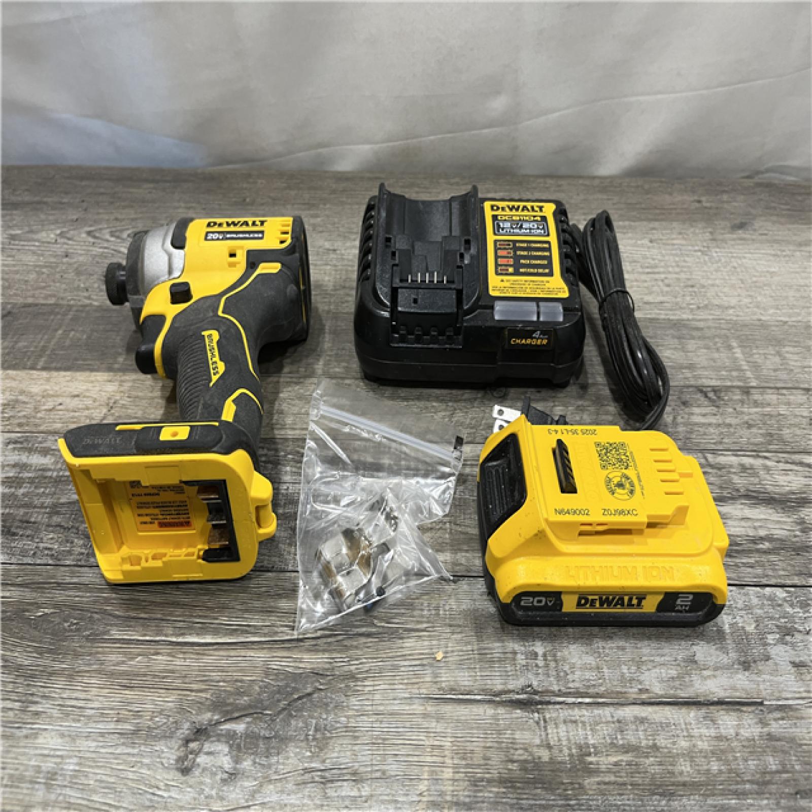 AS-IS DEWALT Atomic 20V Max Lithium-Ion Brushless Cordless Compact 1/4 in. Impact Driver Kit