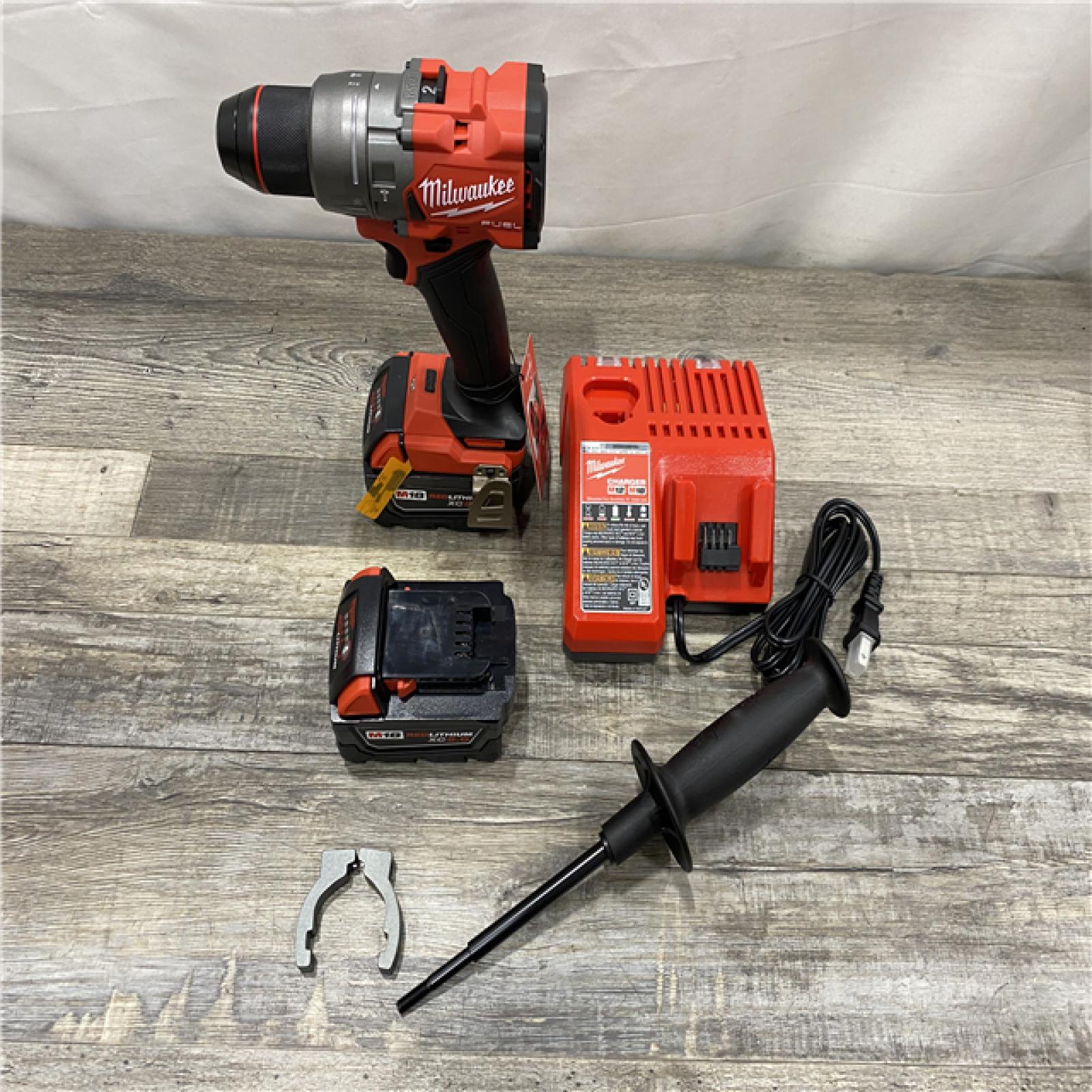 AS-IS Milwaukee FUEL 18V Lithium-Ion Brushless Cordless 1/2 in. Hammer Drill Driver Kit