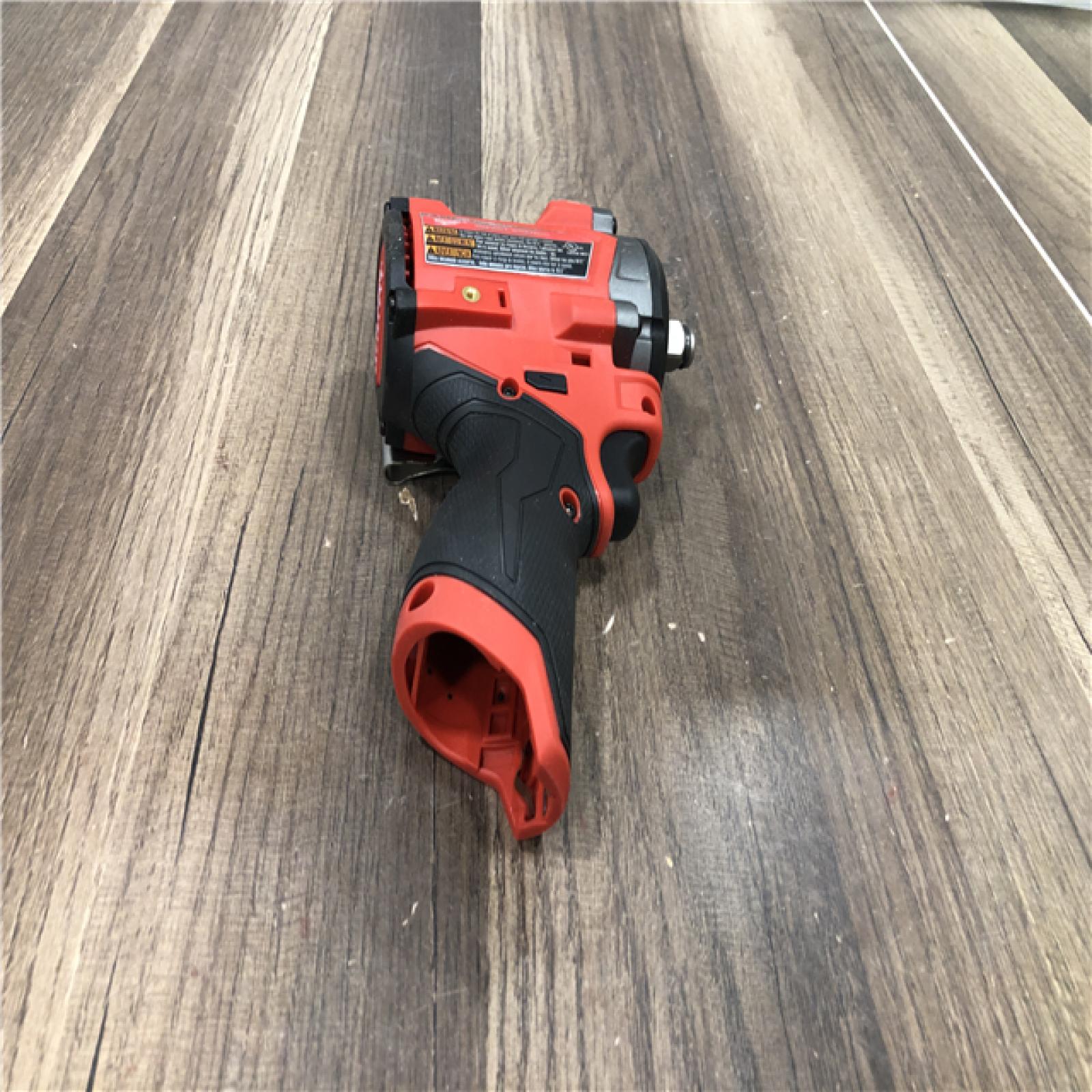 AS-IS Milwaukee FUEL 12V Lithium-Ion Brushless Cordless Stubby 1/2 in. Impact Wrench (Tool-Only)