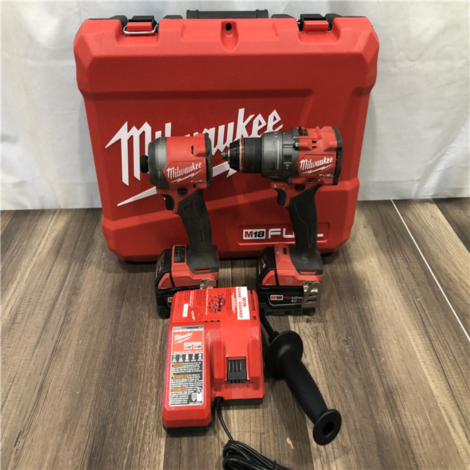 AS-IS Milwaukee FUEL 18V Lithium-Ion Brushless Cordless Hammer Drill and Impact Driver Combo Kit