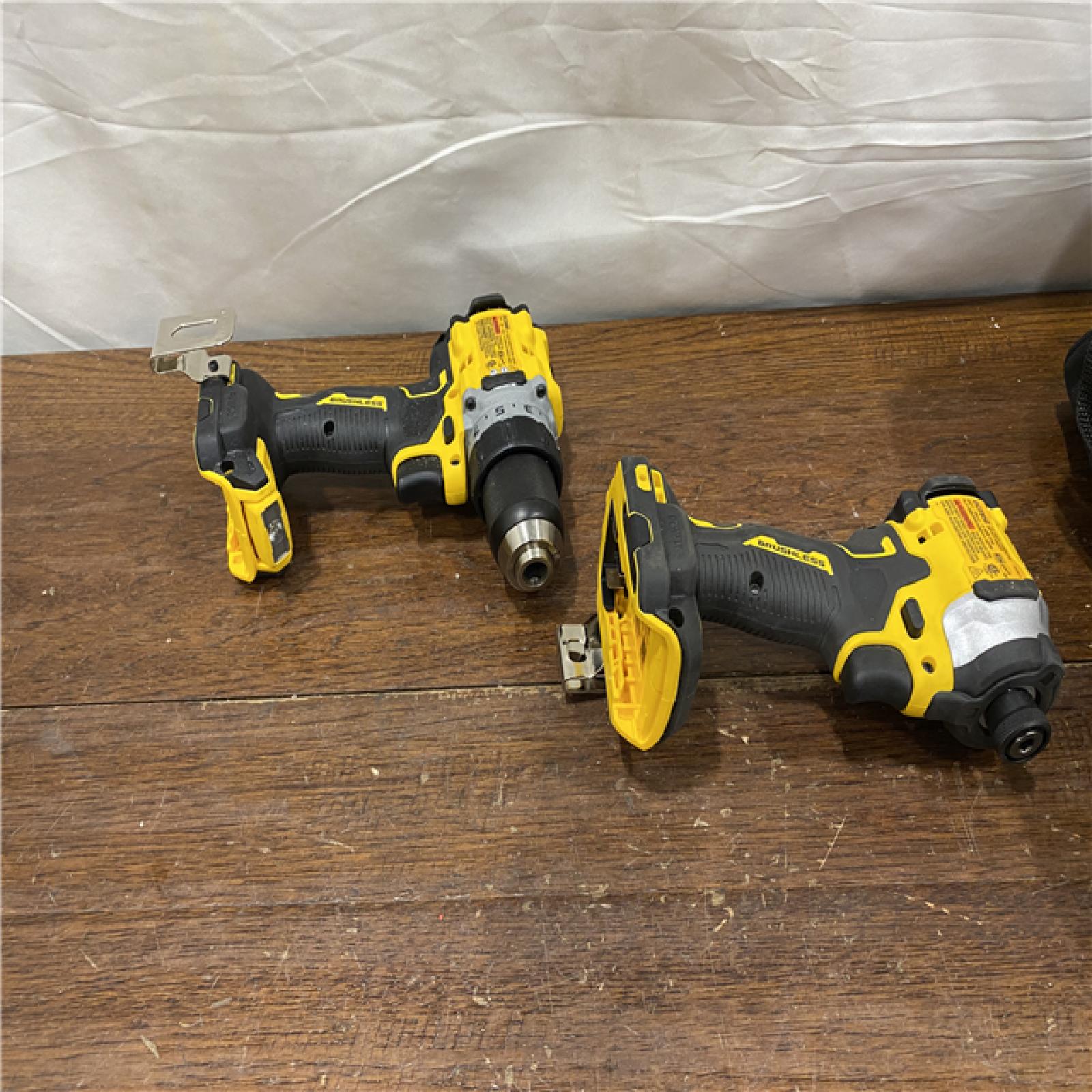 AS-IS DEWALT 20V MAX XR Cordless Drill/Driver, ATOMIC Impact Driver 2 Tool Combo Kit, (2) 2.0Ah Batteries, Charger, and Bag
