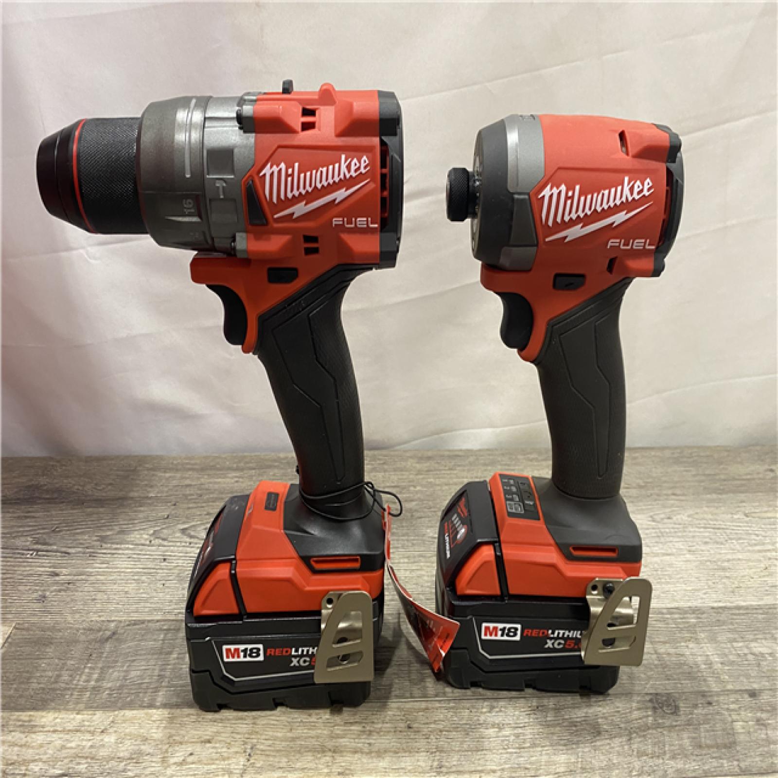 AS-IS Milwaukee  FUEL 18V Lithium-Ion Brushless Cordless Hammer Drill and Impact Driver Combo Kit
