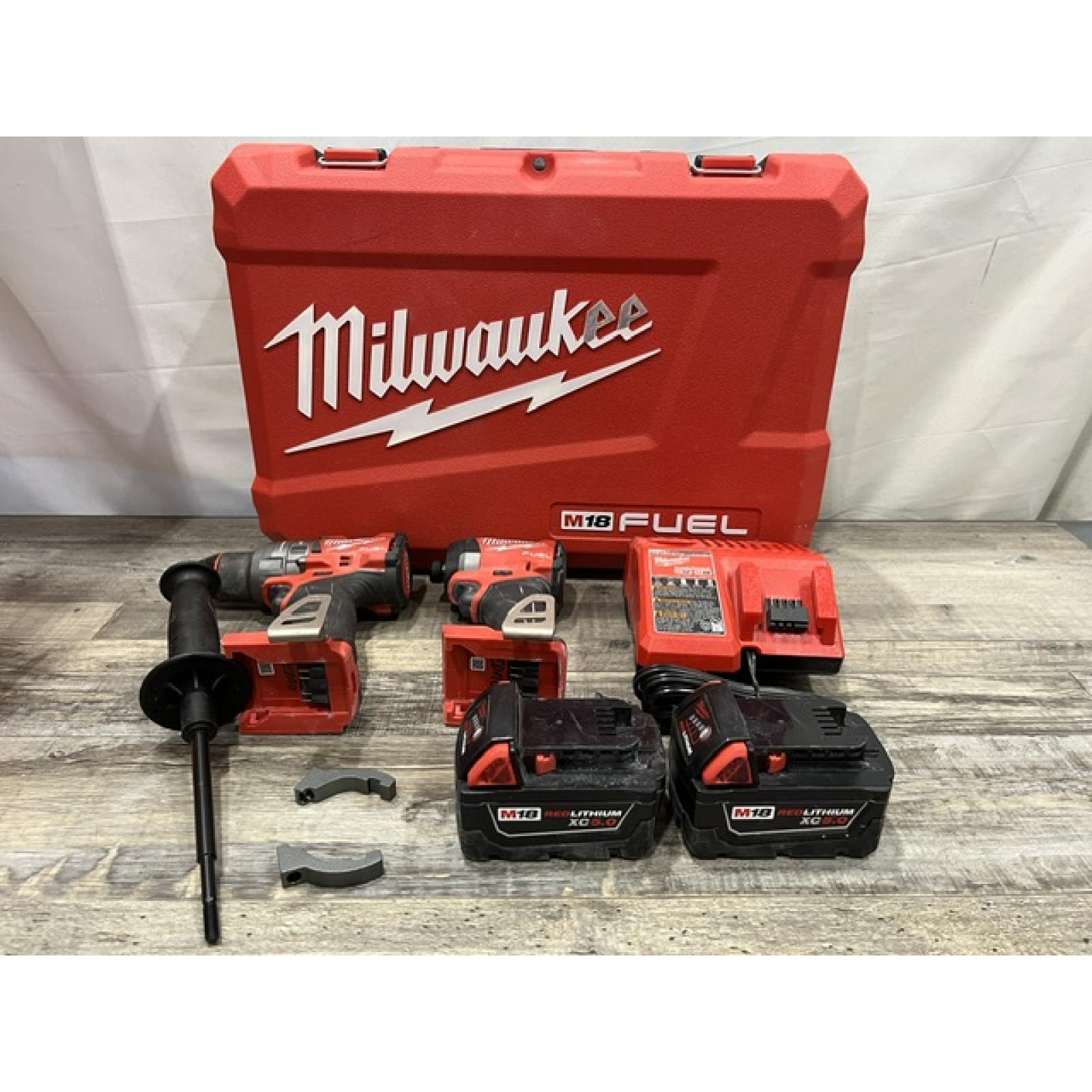AS-IS Milwaukee FUEL 18V Lithium-Ion Brushless Cordless Hammer Drill and Impact Driver Combo Kit