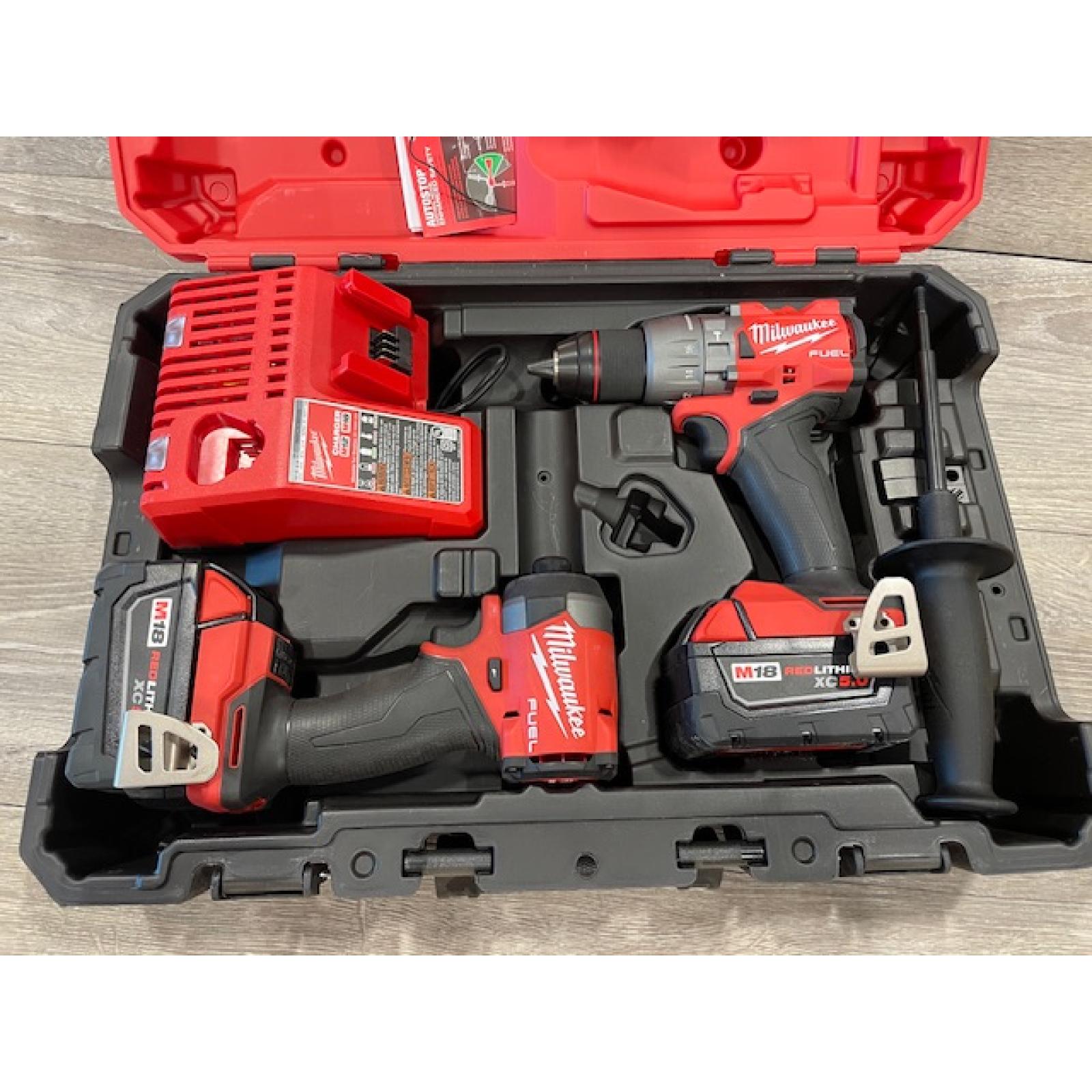 AS-IS Milwaukee FUEL 18V Lithium-Ion Brushless Cordless Hammer Drill and Impact Driver Combo Kit