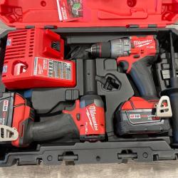 AS-IS Milwaukee FUEL 18V Lithium-Ion Brushless Cordless Hammer Drill and Impact Driver Combo Kit