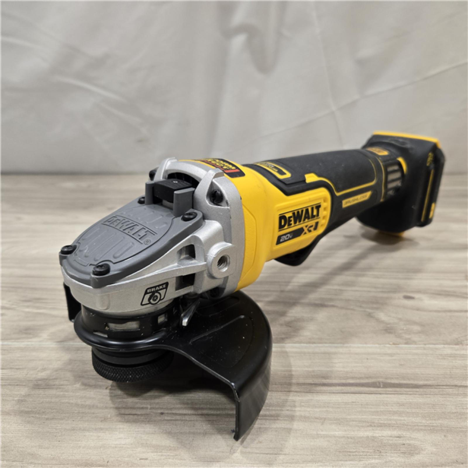 AS-IS DeWalt 20V XR Cordless 4-1/2. in. to 5 in. Angle Grinder (Tool Only)