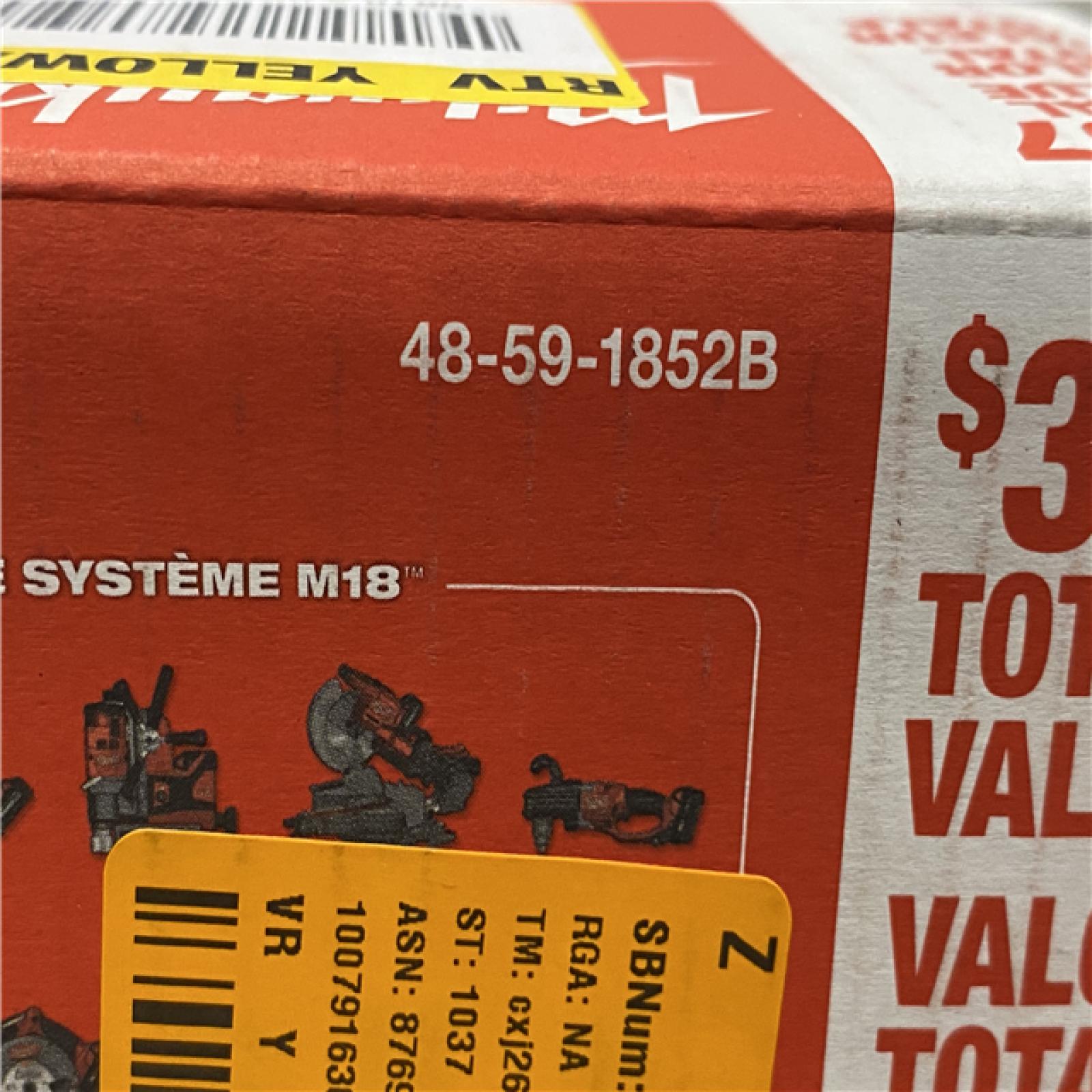 NEW - Milwaukee 18-Volt Lithium-Ion XC Starter Kit with Two 5.0Ah Batteries and Charger