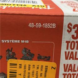 NEW - Milwaukee 18-Volt Lithium-Ion XC Starter Kit with Two 5.0Ah Batteries and Charger