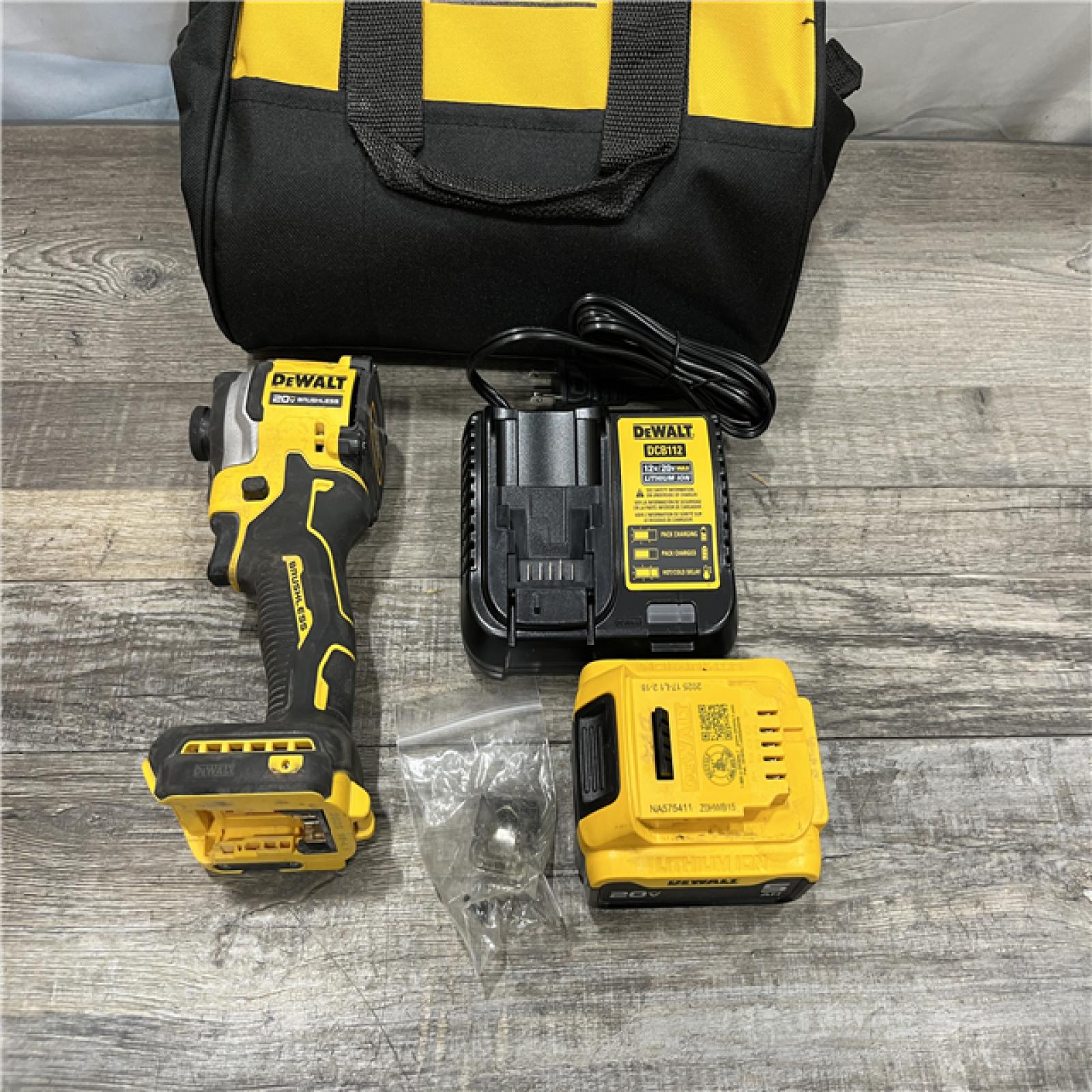 AS-IS DEWALT ATOMIC 20V MAX Lithium-Ion Cordless 1/4 in. Brushless Impact Driver Kit