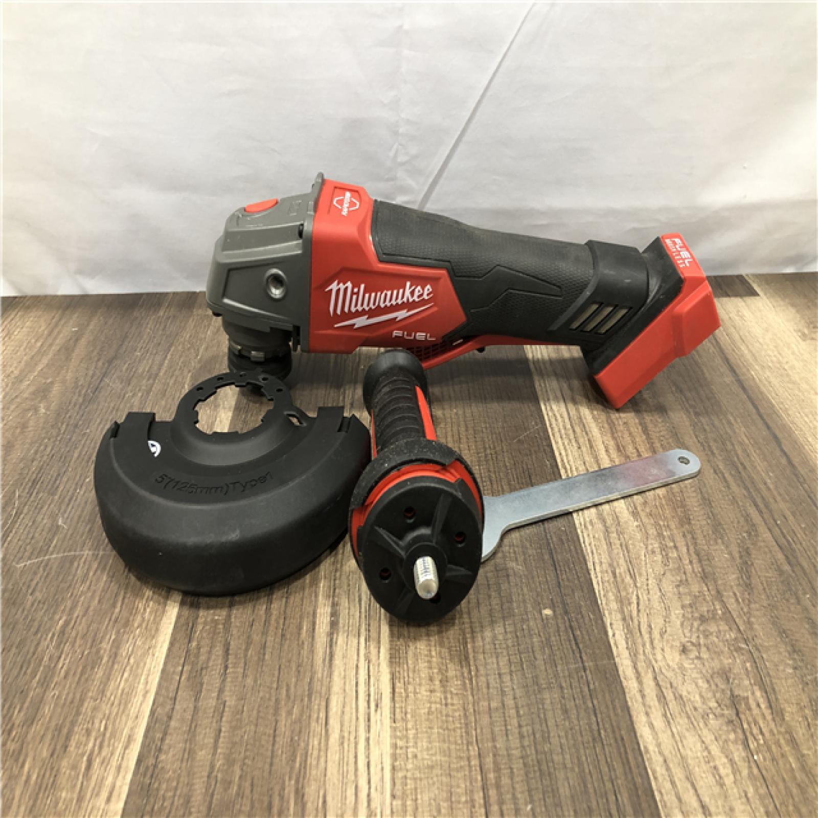 AS-IS Milwaukee FUEL 18V Lithium-Ion Brushless Cordless 4-1/2 in./5 in. Grinder w/Paddle Switch (Tool-Only)